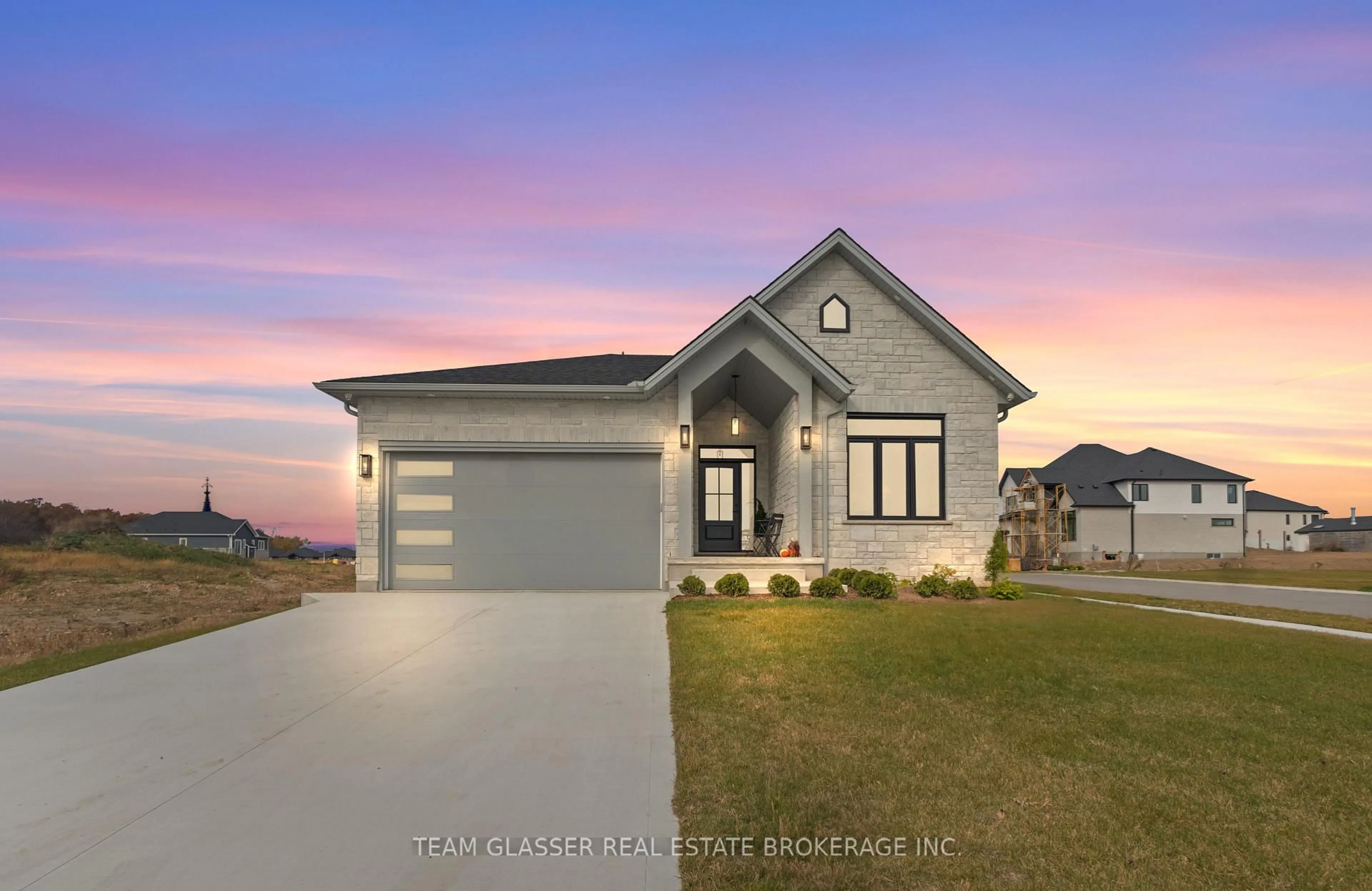 Home with vinyl exterior material, street for 70 (Lot 94) Benner Blvd, Middlesex Centre Ontario N0L 1R0