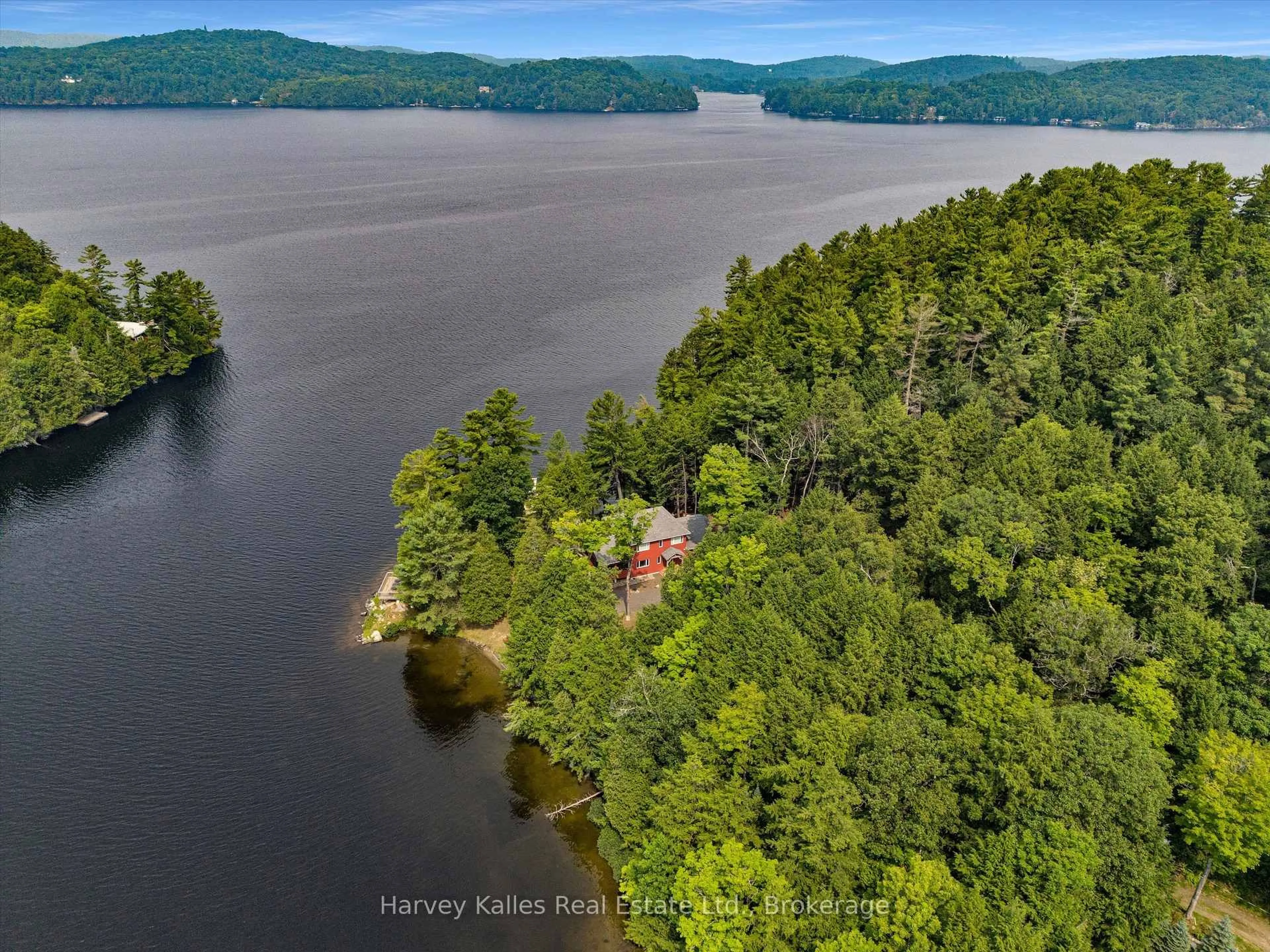 A pic from outside/outdoor area/front of a property/back of a property/a pic from drone, water/lake/river/ocean view for 3-1030 Raven Hill Rd, Lake of Bays Ontario P0A 1H0