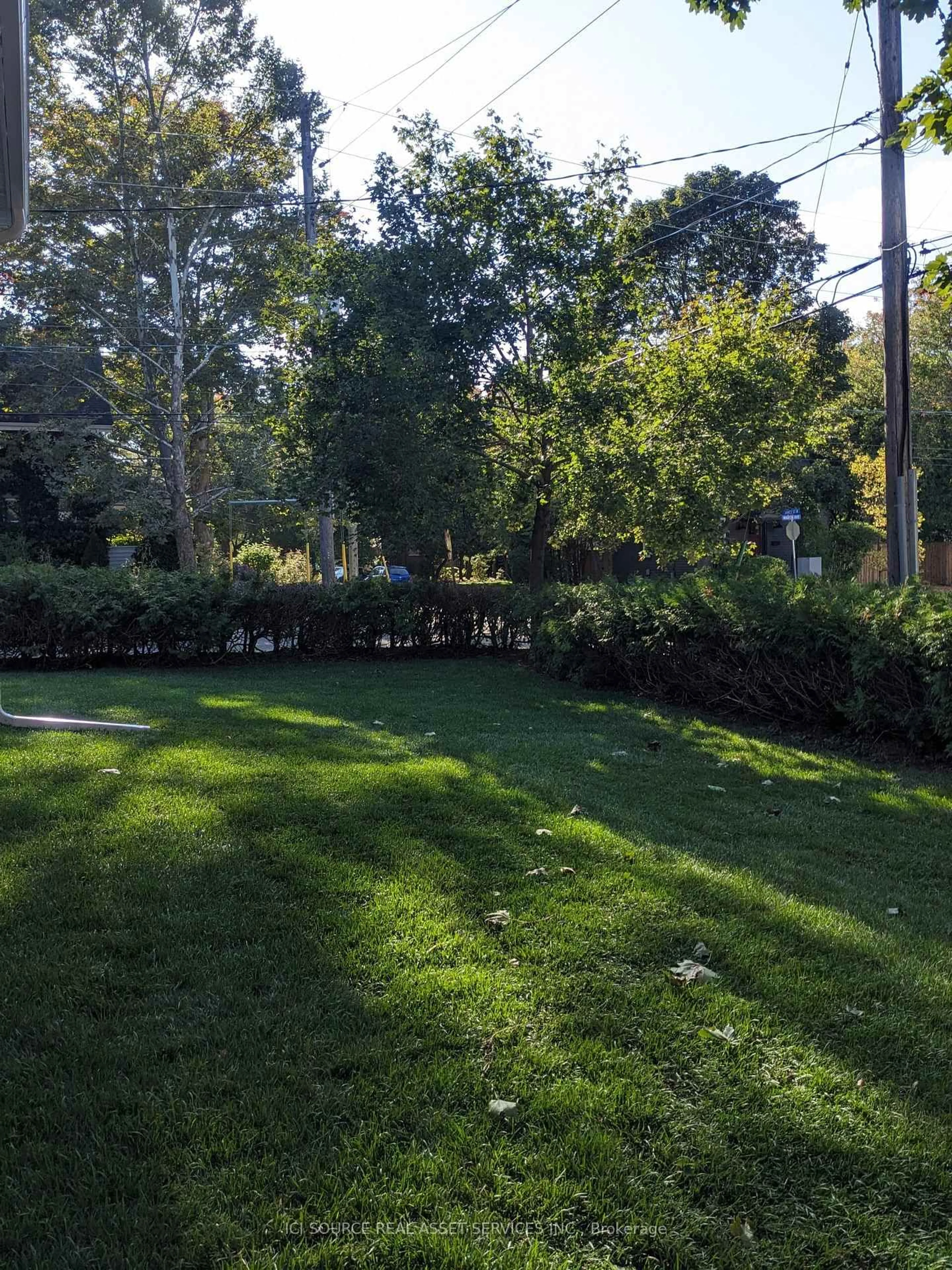 A pic from outside/outdoor area/front of a property/back of a property/a pic from drone, forest/trees view for 58 Martin Ave, Guelph Ontario N1G 1Z9