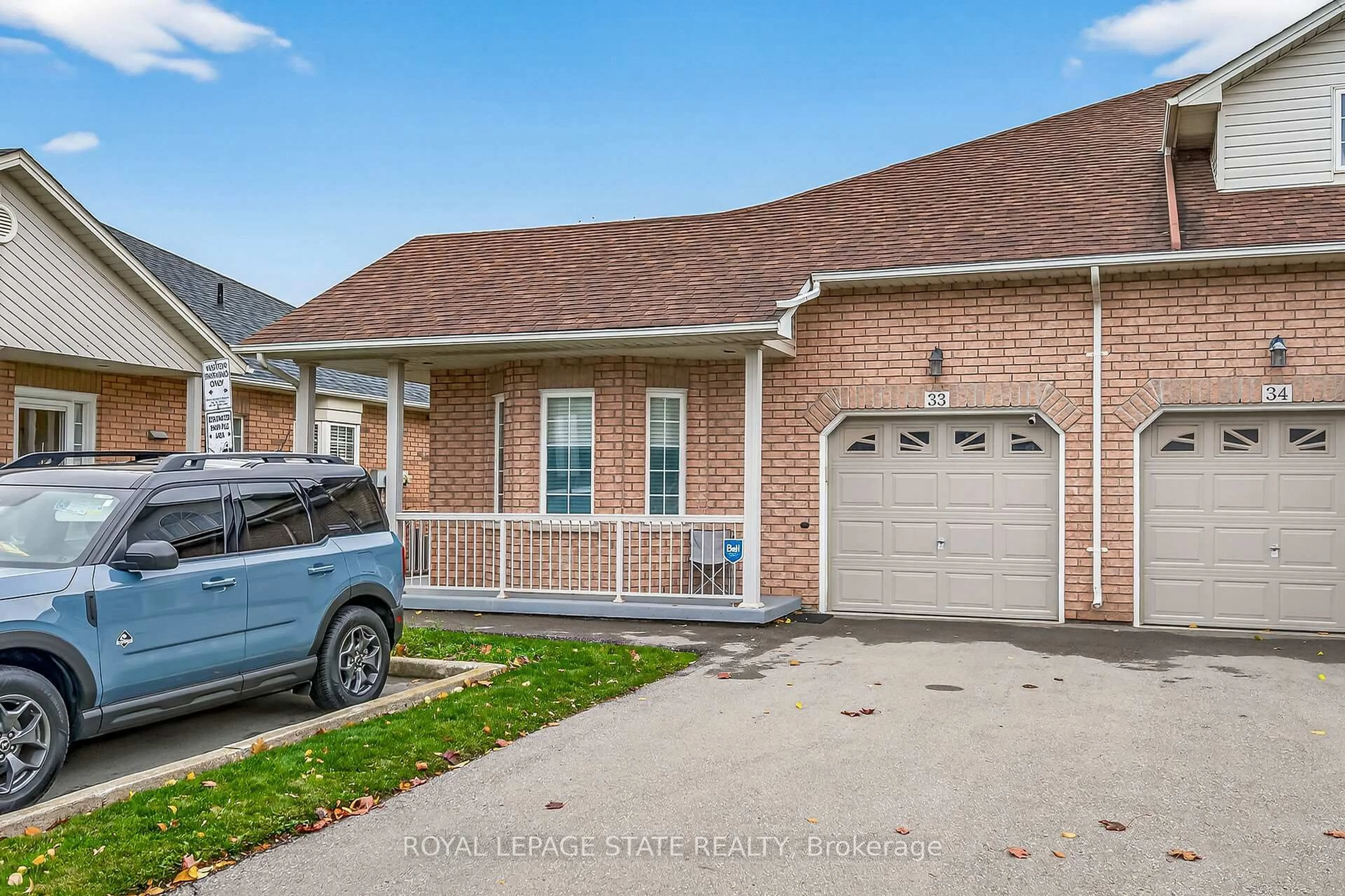 Home with brick exterior material, street for 213 Nash Rd #33, Hamilton Ontario L8K 6S2