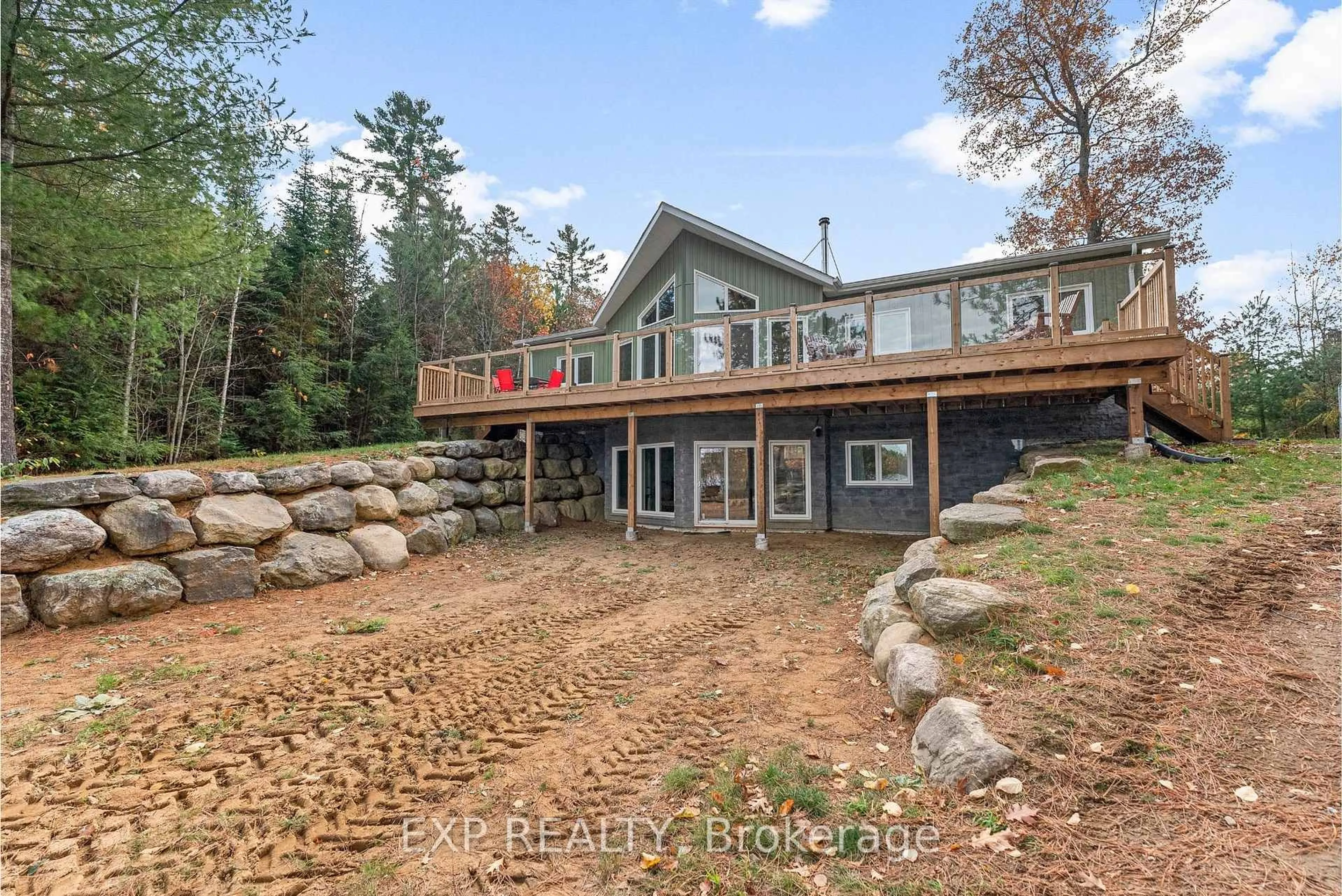 A pic from outside/outdoor area/front of a property/back of a property/a pic from drone, water/lake/river/ocean view for 79 Warbler Way, Combermere Ontario K0J 1L0