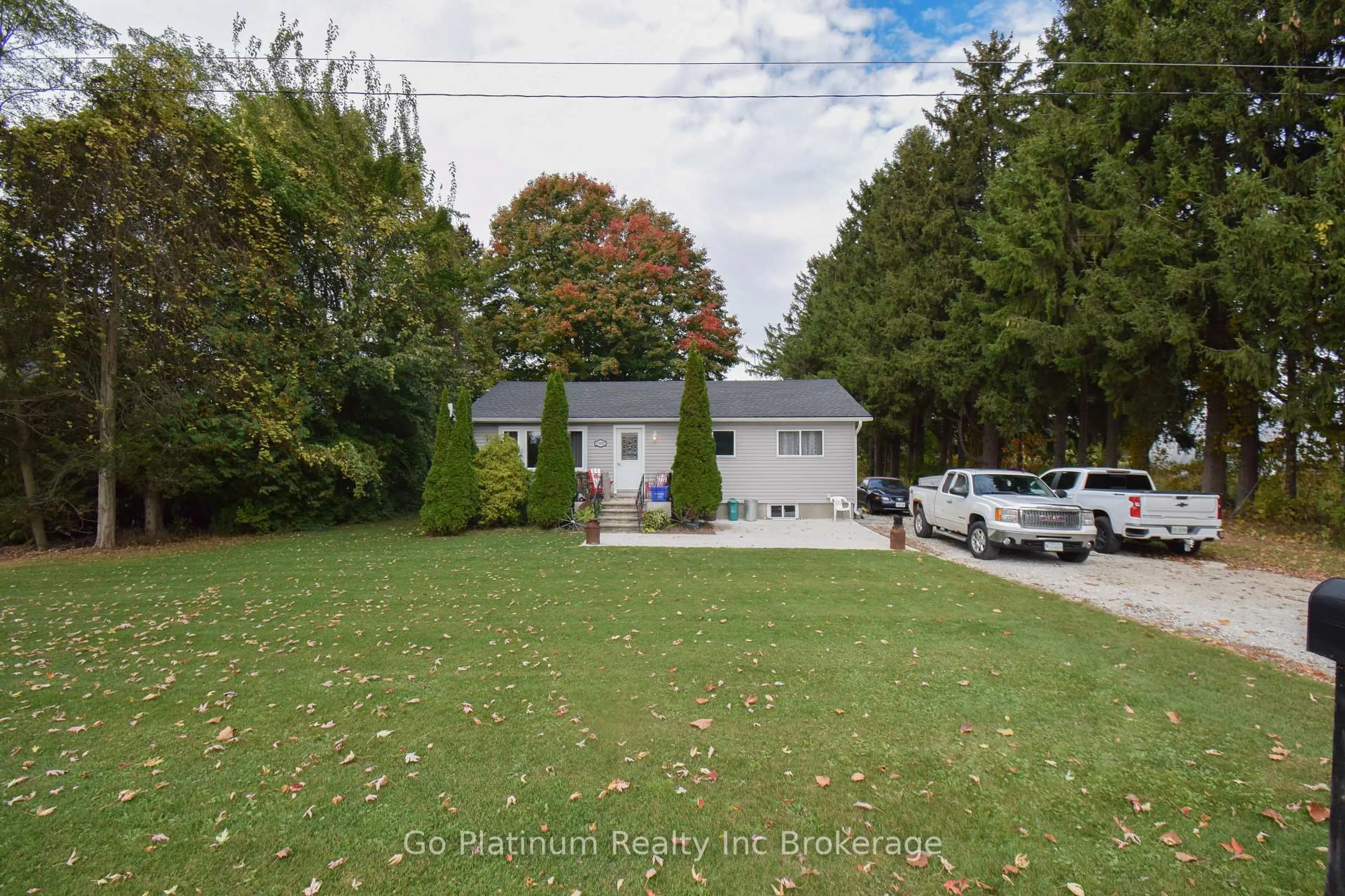 A pic from outside/outdoor area/front of a property/back of a property/a pic from drone, street for 23092 Pioneer Line, West Elgin Ontario N0L 2C0