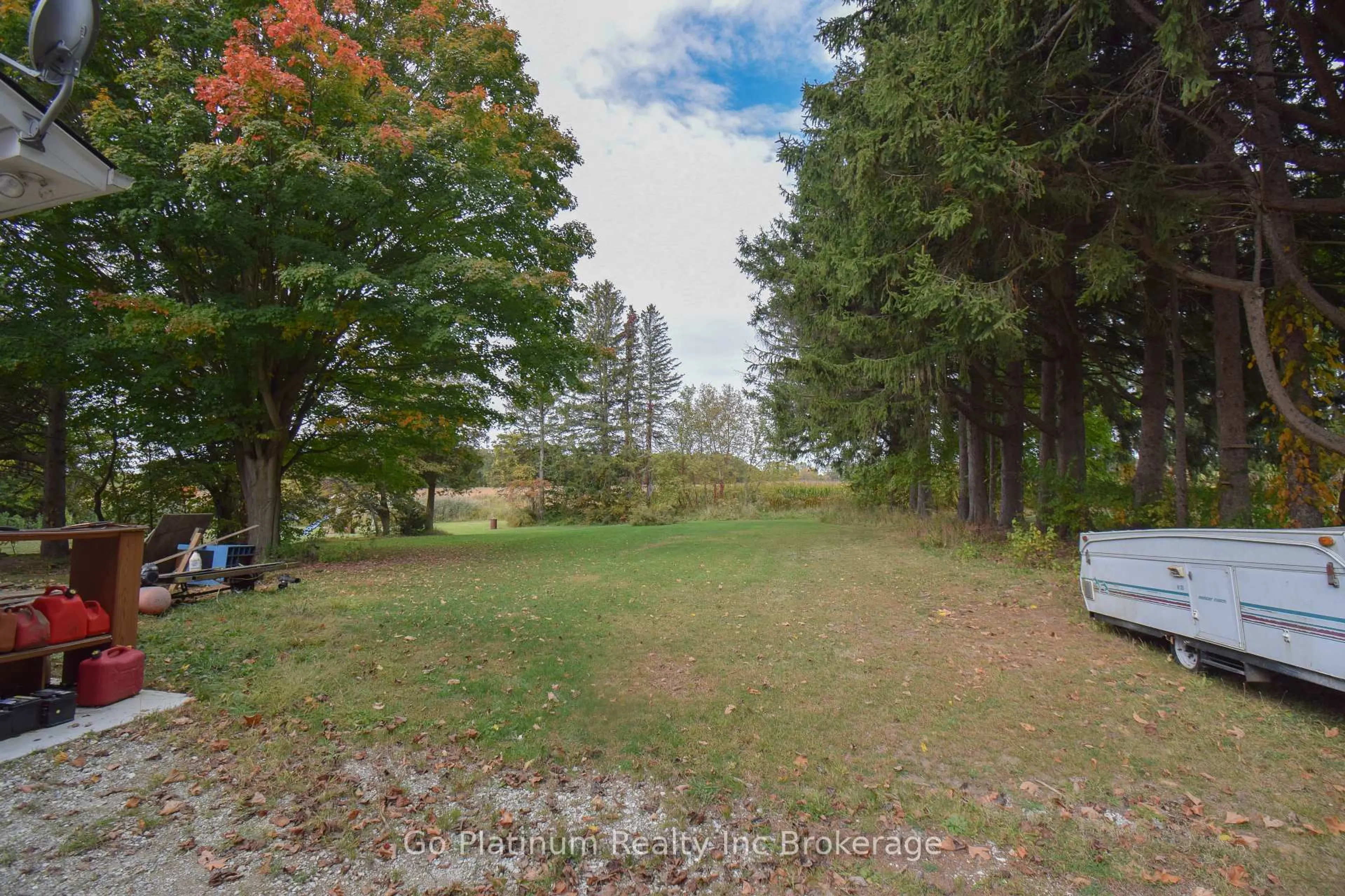 A pic from outside/outdoor area/front of a property/back of a property/a pic from drone, forest/trees view for 23092 Pioneer Line, West Elgin Ontario N0L 2C0
