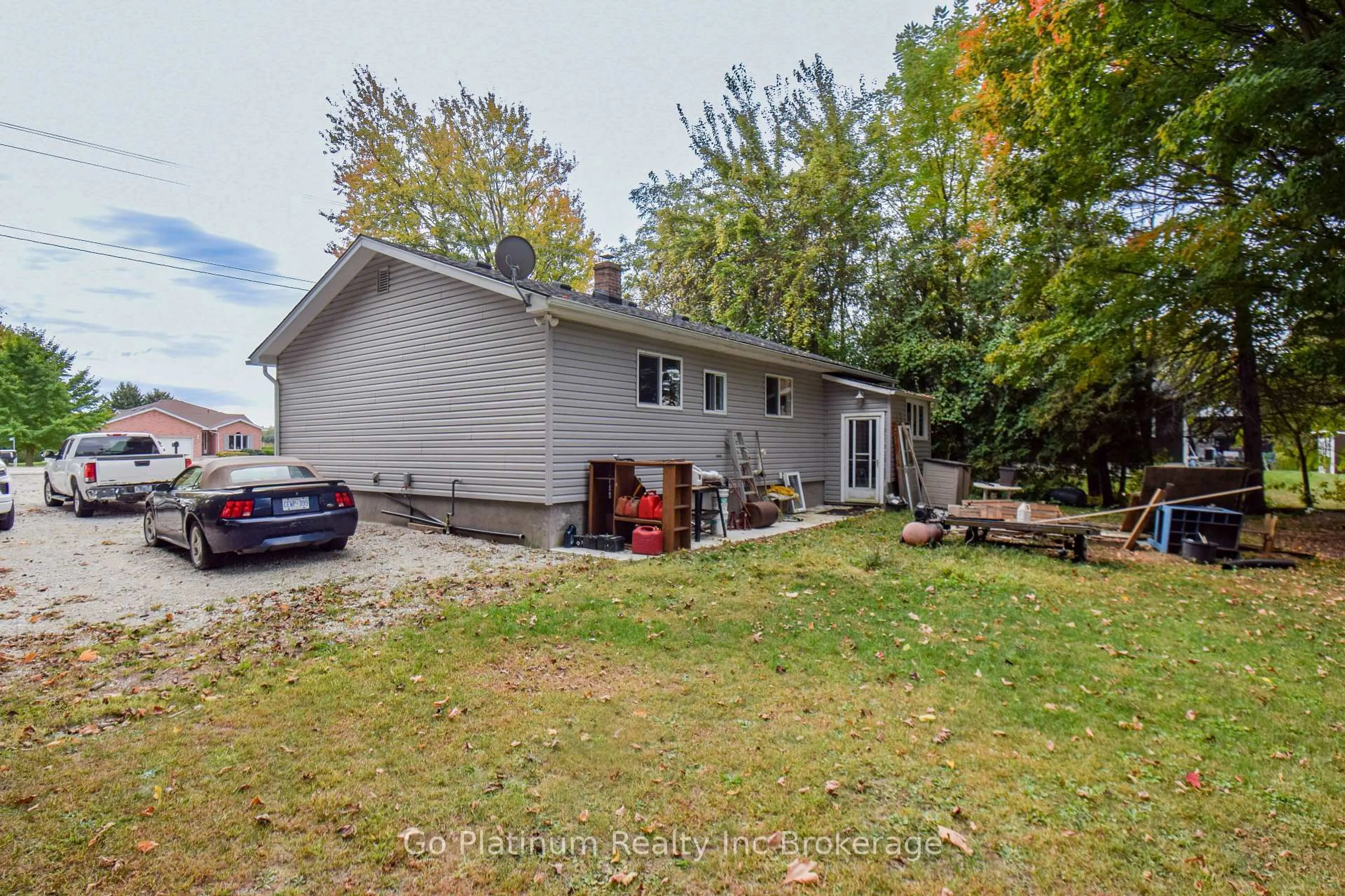 A pic from outside/outdoor area/front of a property/back of a property/a pic from drone, unknown for 23092 Pioneer Line, West Elgin Ontario N0L 2C0