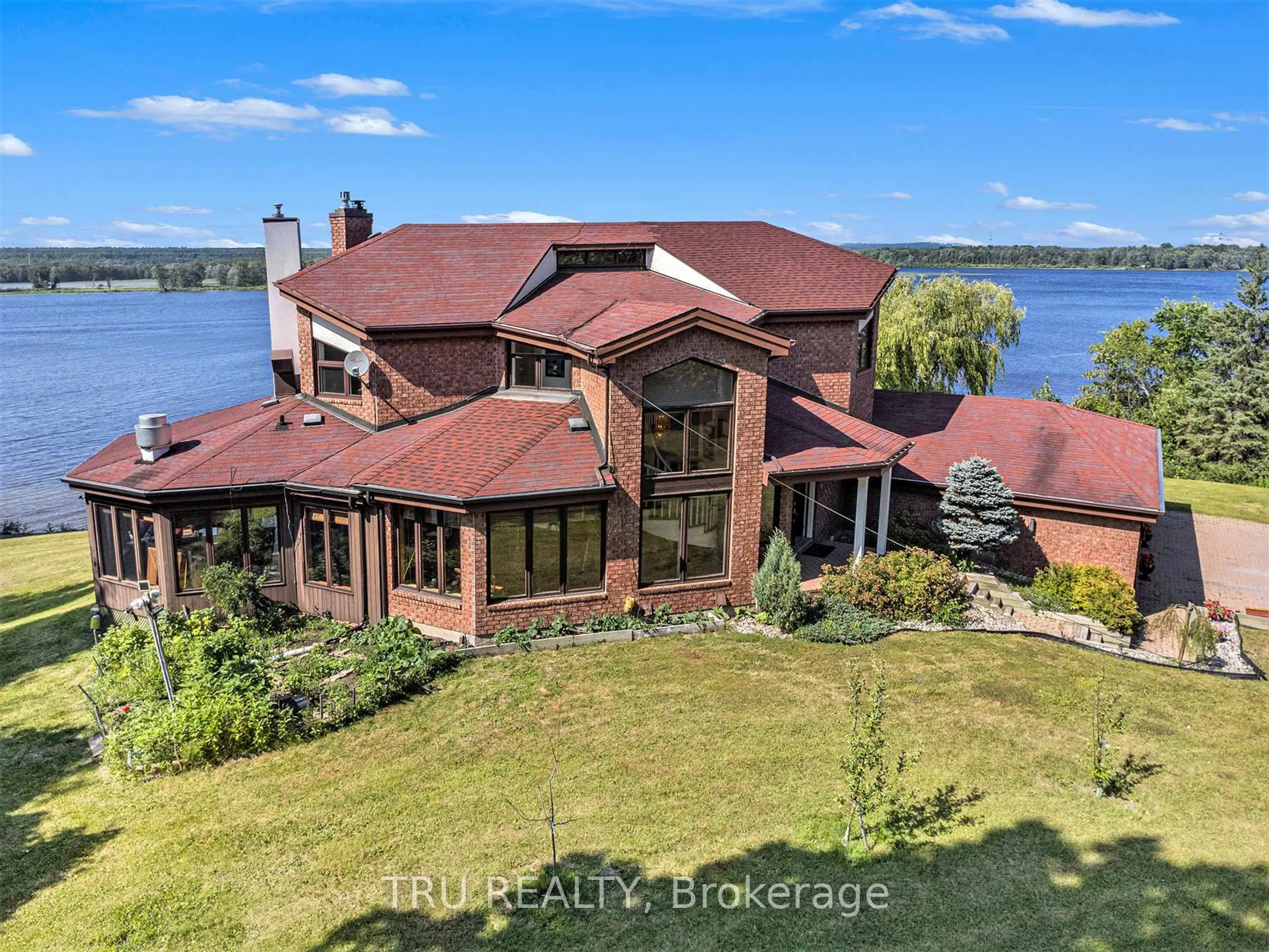 A pic from outside/outdoor area/front of a property/back of a property/a pic from drone, water/lake/river/ocean view for 1915 REGIONAL ROAD 174 Highway, Ottawa Ontario K4C 1H5