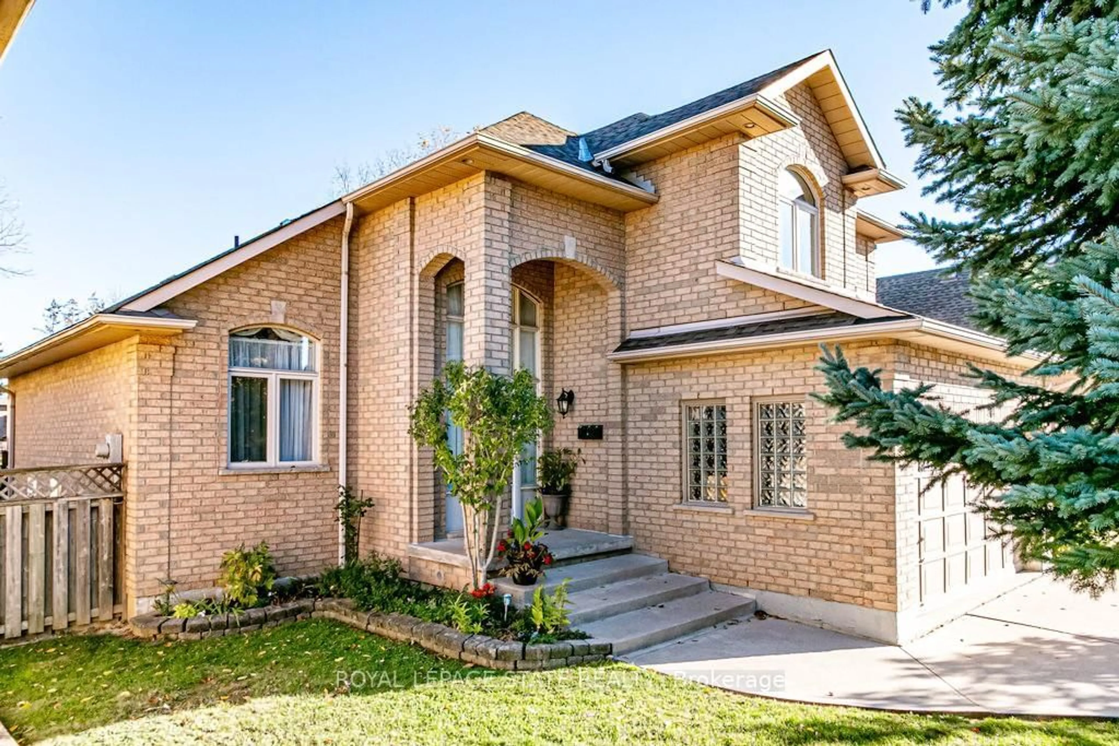 Home with brick exterior material, street for 54 Falconridge Dr, Hamilton Ontario L9B 2P3