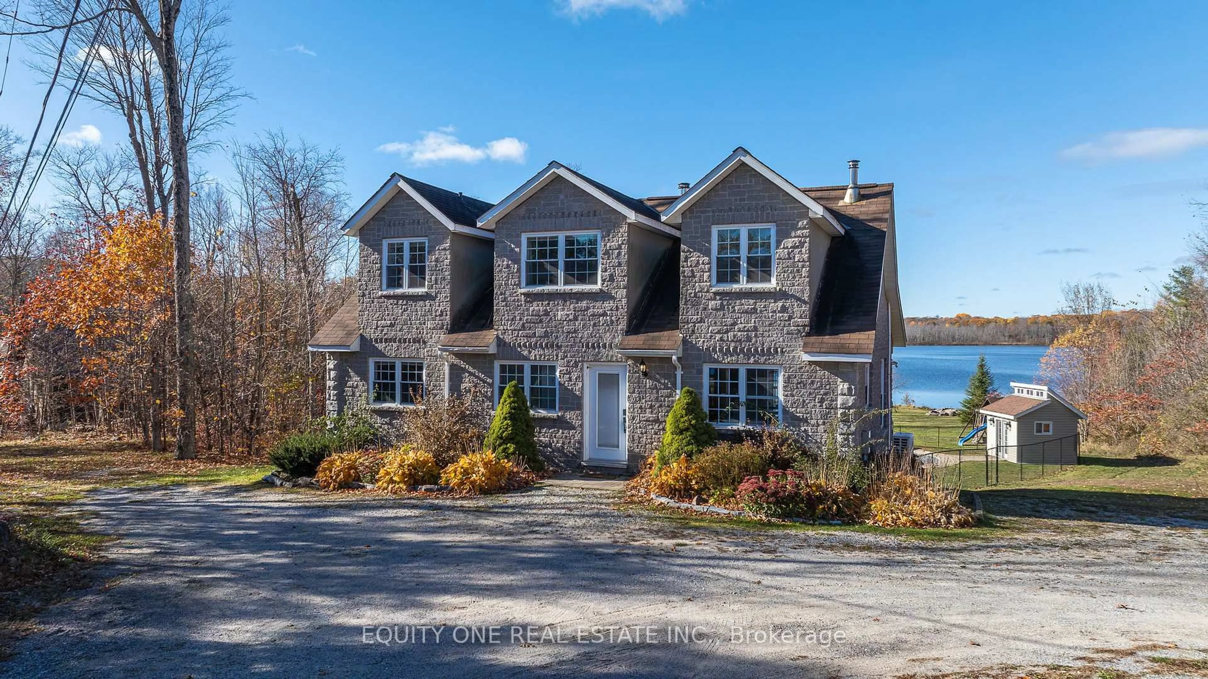 A pic from outside/outdoor area/front of a property/back of a property/a pic from drone, water/lake/river/ocean view for 1099c Polar Bear Lane, Sharbot Lake Ontario K0H 2P0