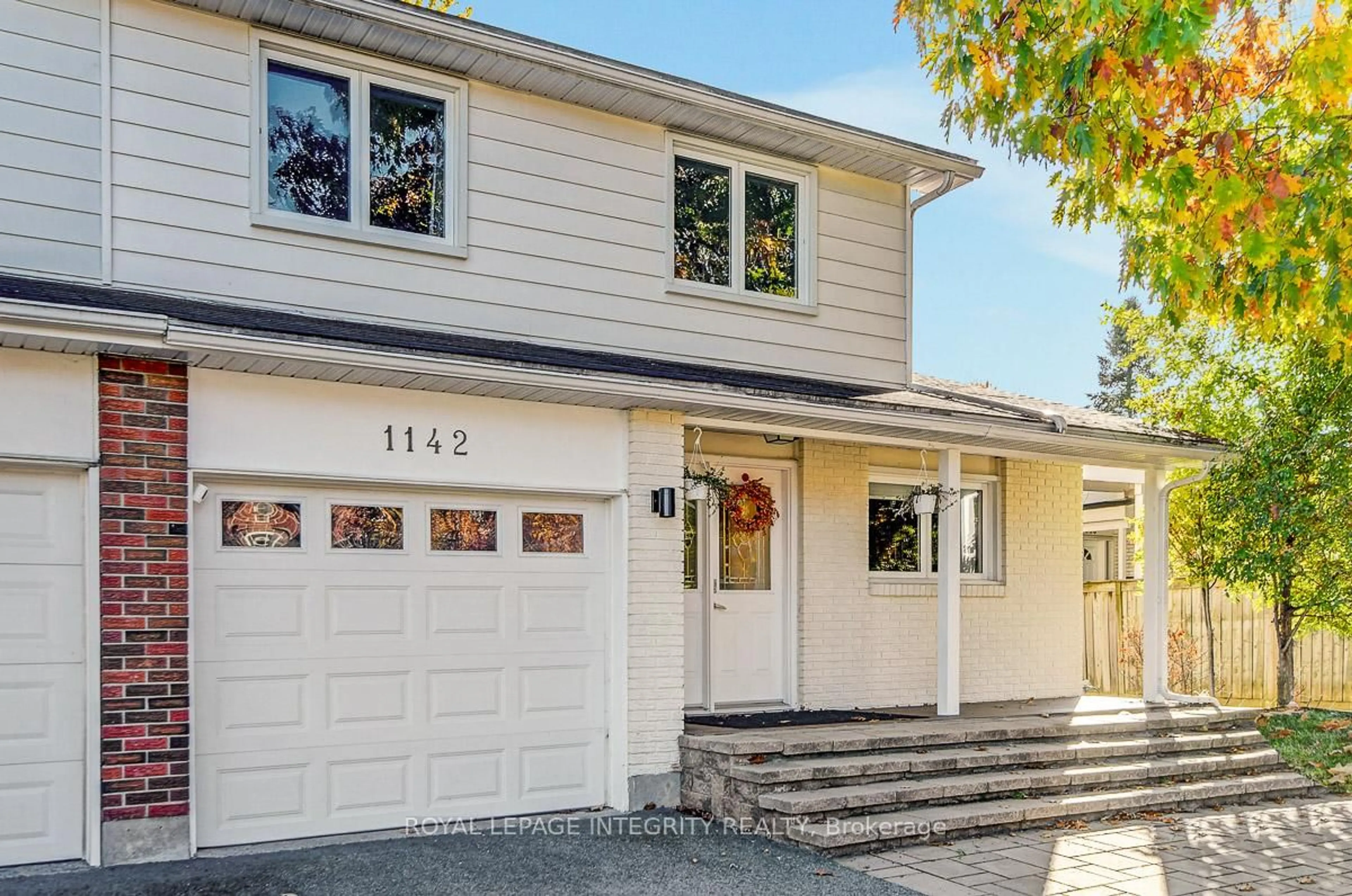 Home with vinyl exterior material, street for 1142 Elmlea Dr, Ottawa Ontario K1J 6V9