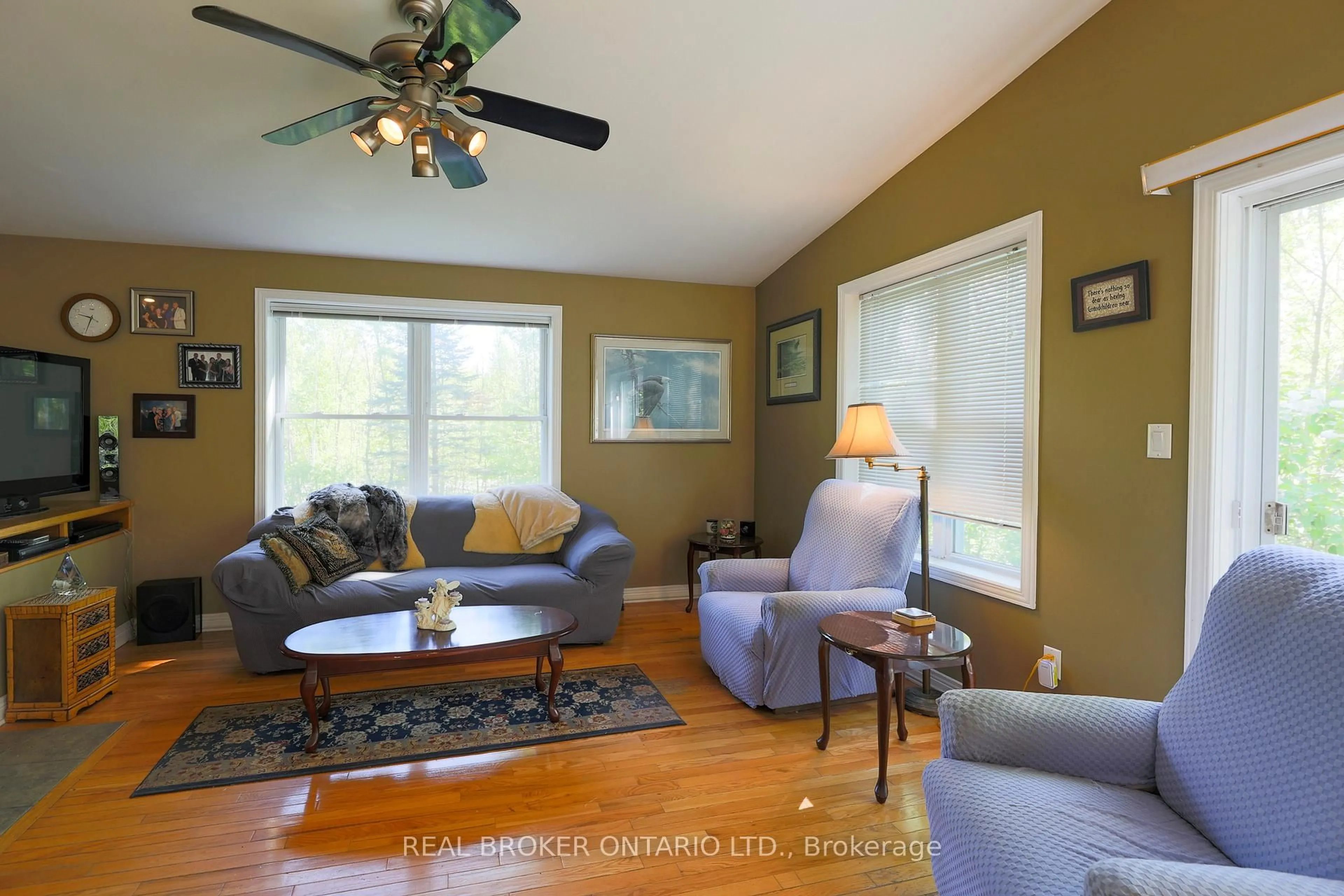 Living room with furniture, wood/laminate floor for 988 County 44 Rd, North Grenville Ontario K0G 1T0