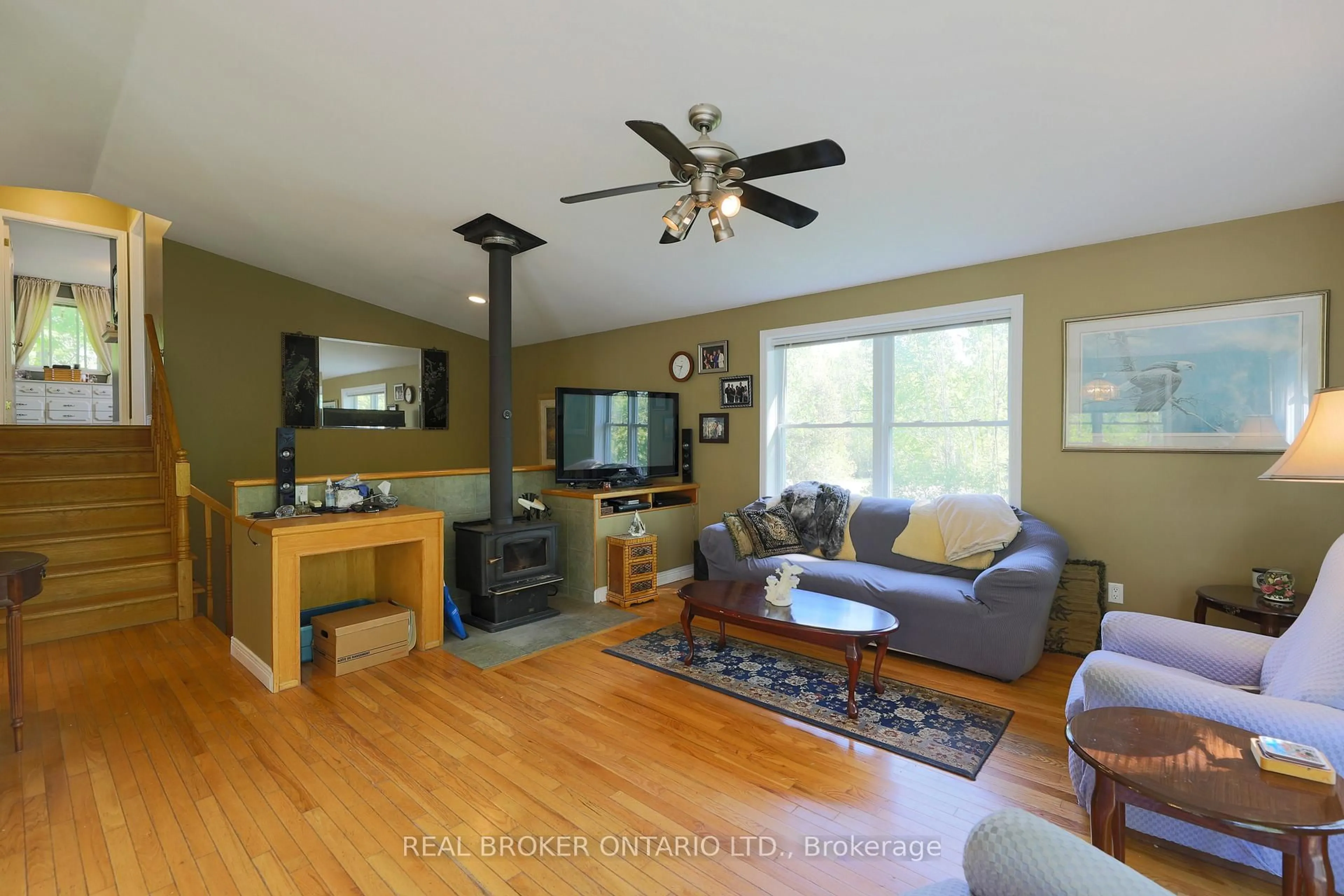 Living room with furniture, wood/laminate floor for 988 County 44 Rd, North Grenville Ontario K0G 1T0