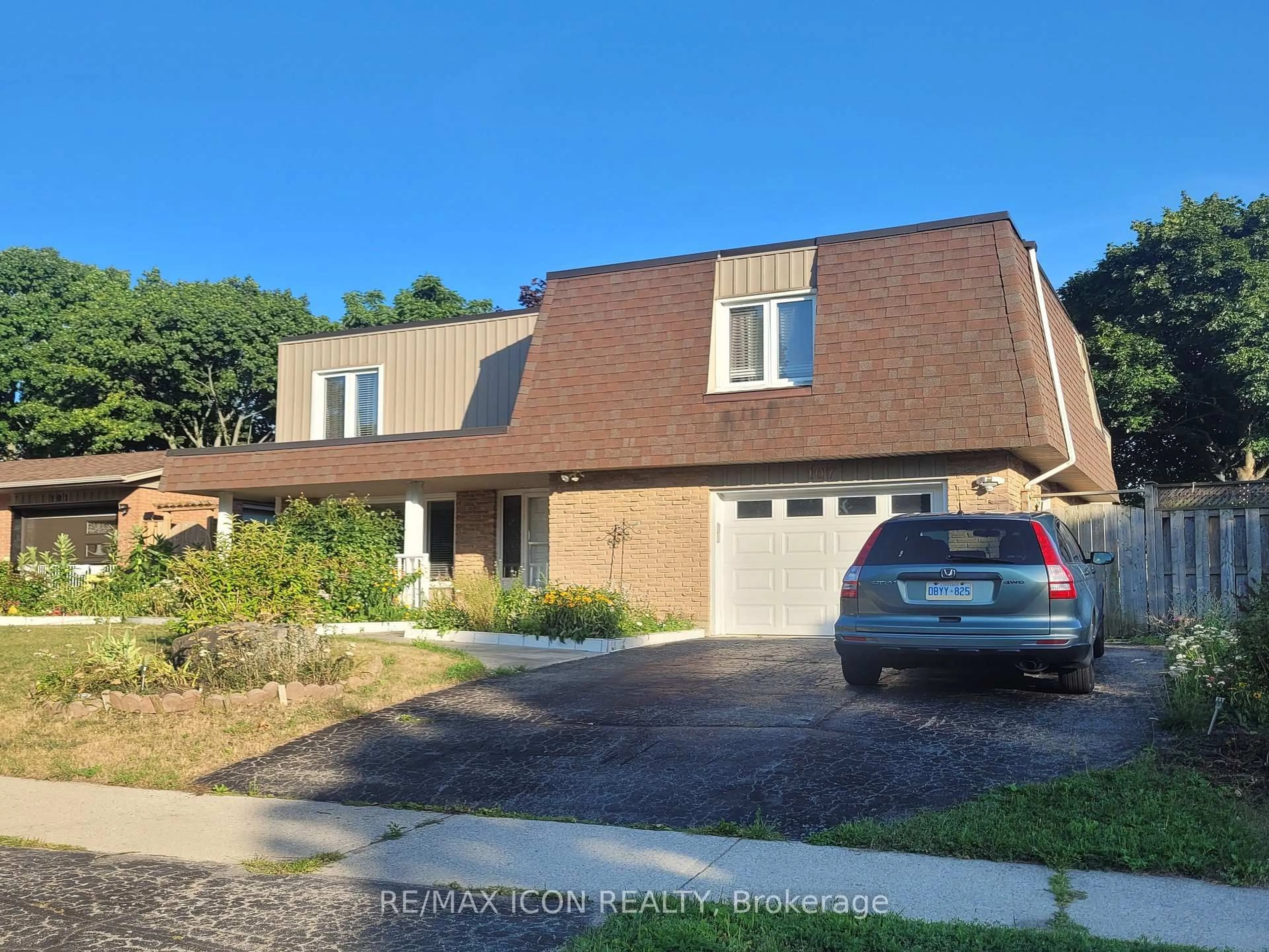 Home with brick exterior material, street for 107 Roseneath Cres, Kitchener Ontario N2E 1V8