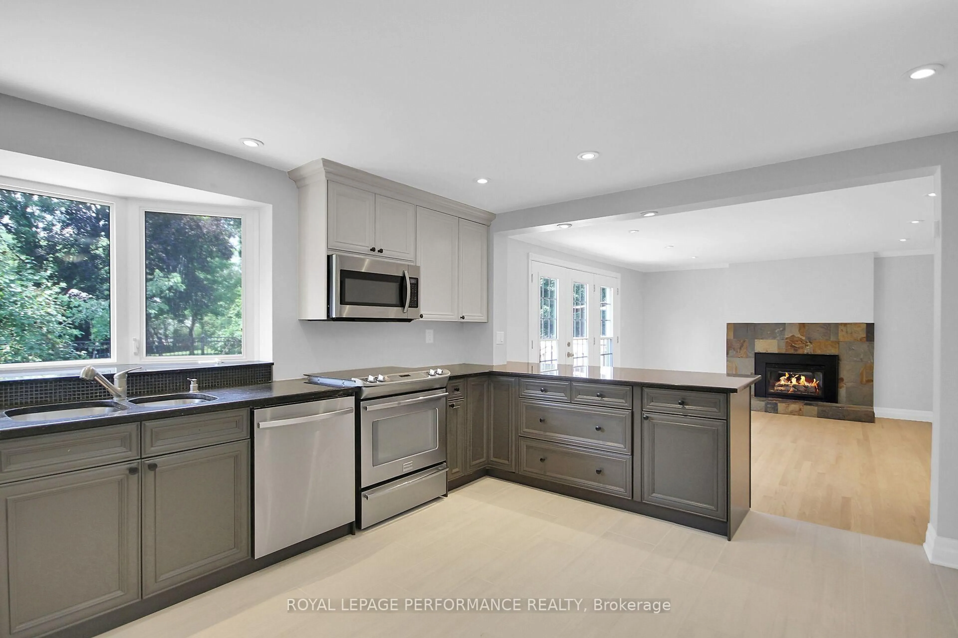 Open concept kitchen, ceramic/tile floor for 82 Queensline Dr, Ottawa Ontario K2H 7J5