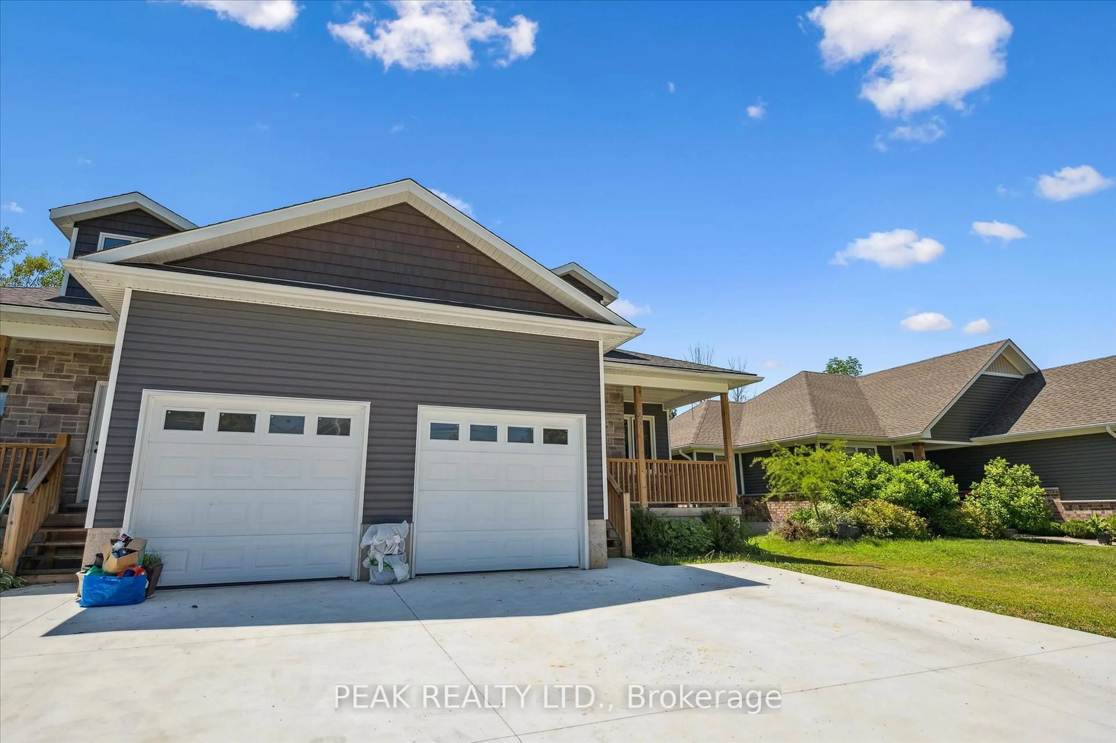 Home with vinyl exterior material, street for 22 Ann St, Minto Ontario N0G 1M0