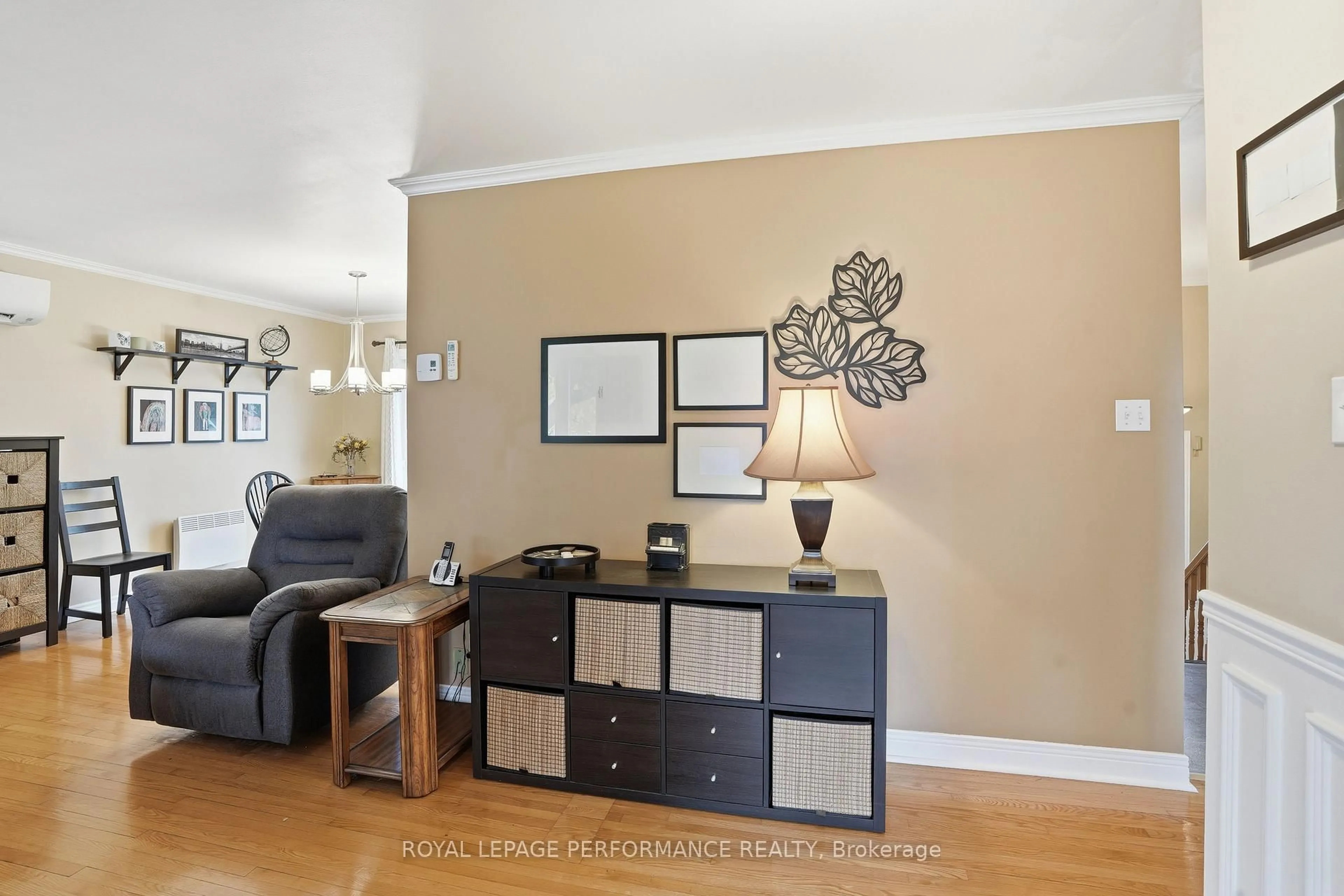 Living room with furniture, wood/laminate floor for 760 Cartier Blvd, Hawkesbury Ontario K6A 1W7