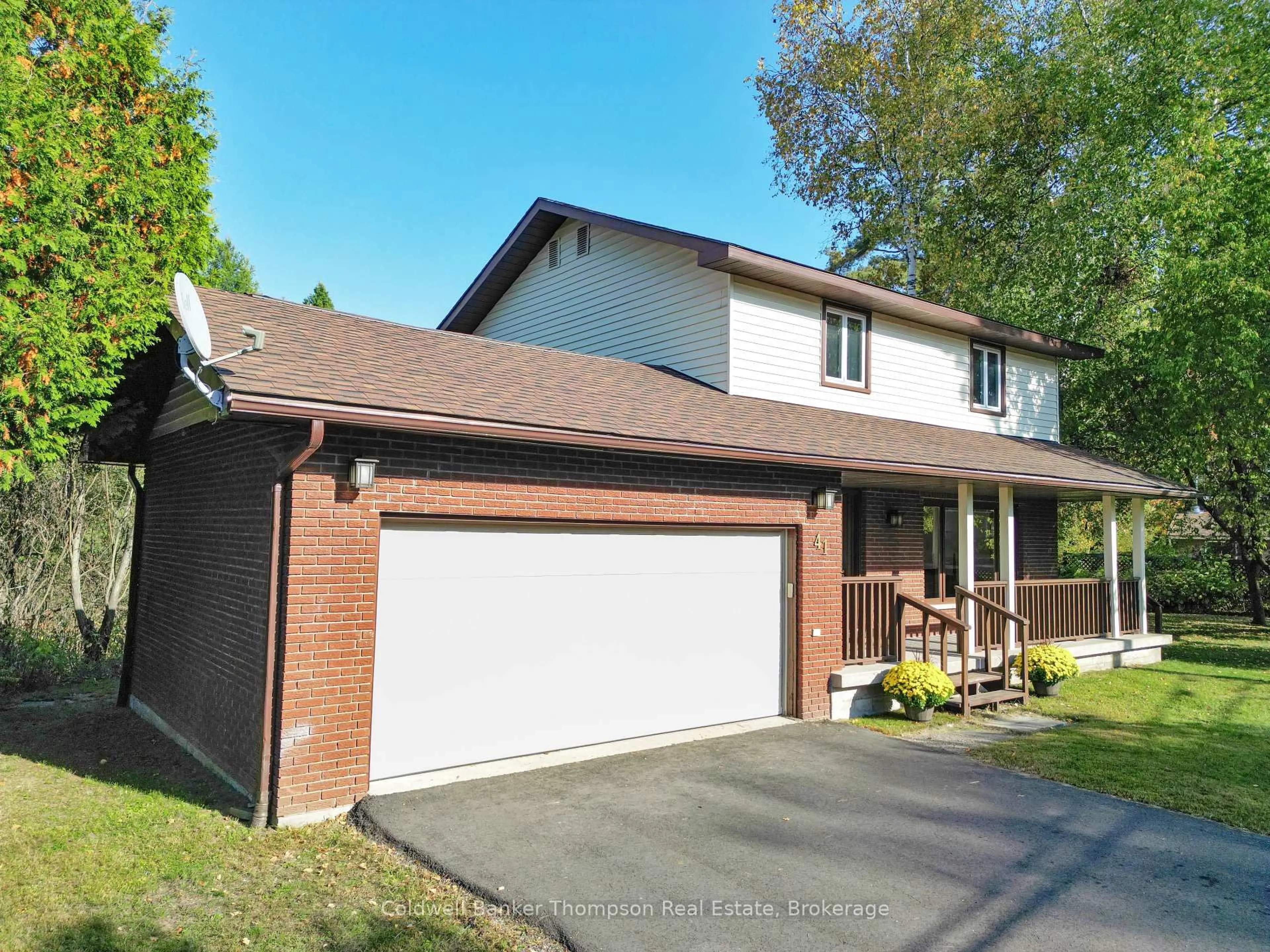 Home with brick exterior material, street for 41 Hodges Lane, Huntsville Ontario P1H 1M7