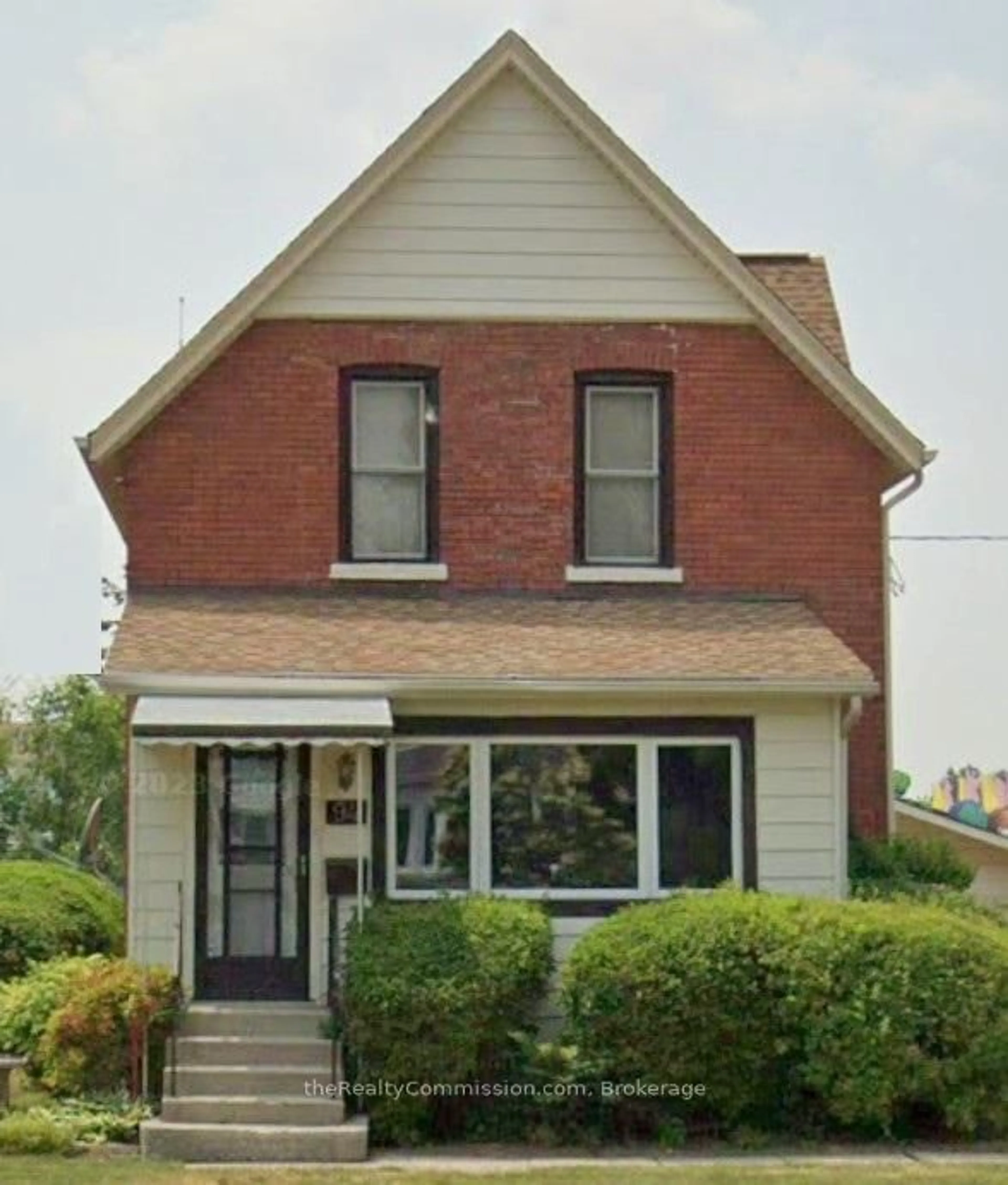 Home with brick exterior material, street for 94 Park Ave, St. Thomas Ontario N5R 4W1