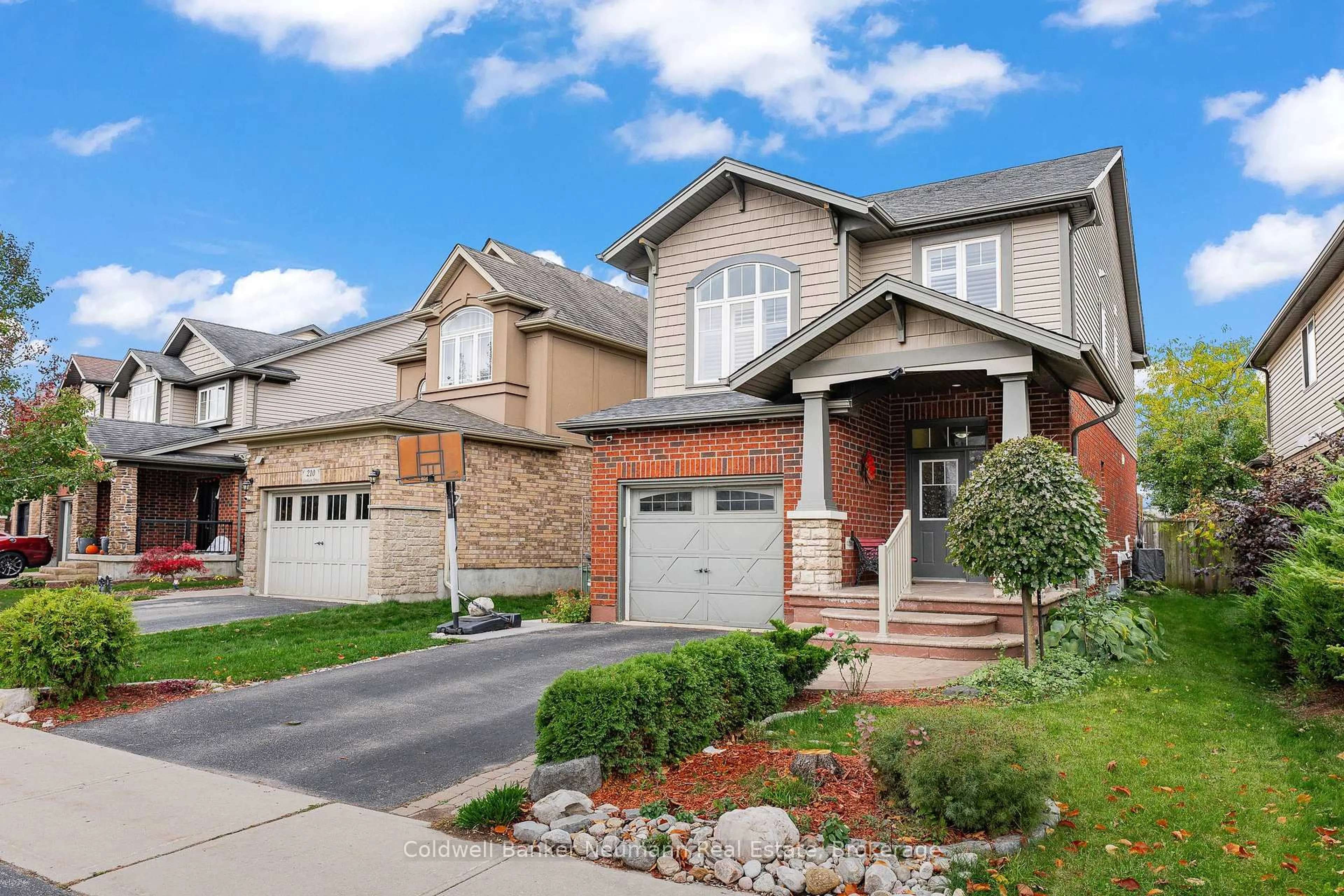 Home with brick exterior material, street for 212 Goodwin Dr, Guelph Ontario N1L 0C8