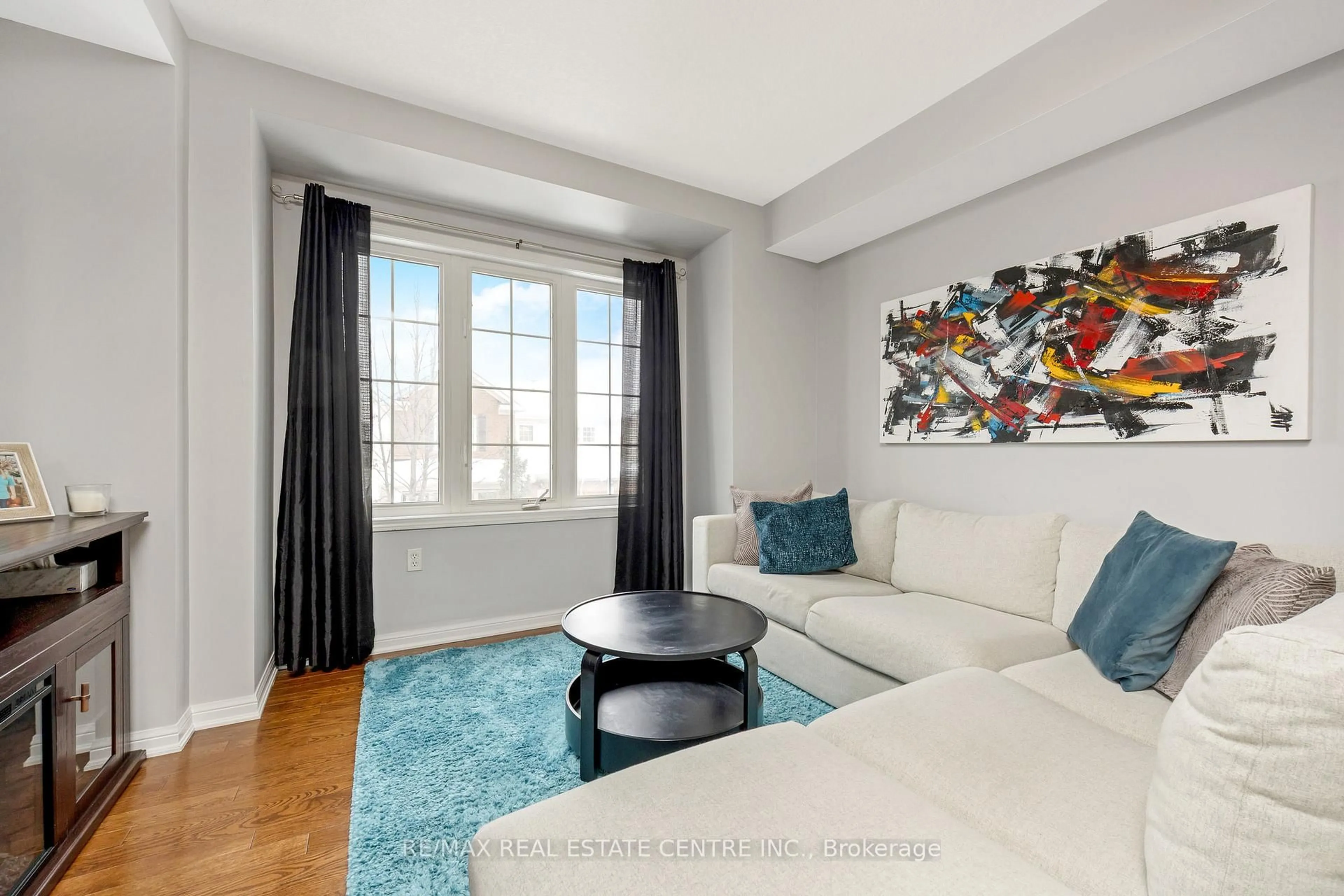 Living room with furniture, unknown for 71 Garth Massey Dr #80, Cambridge Ontario N1T 2G8