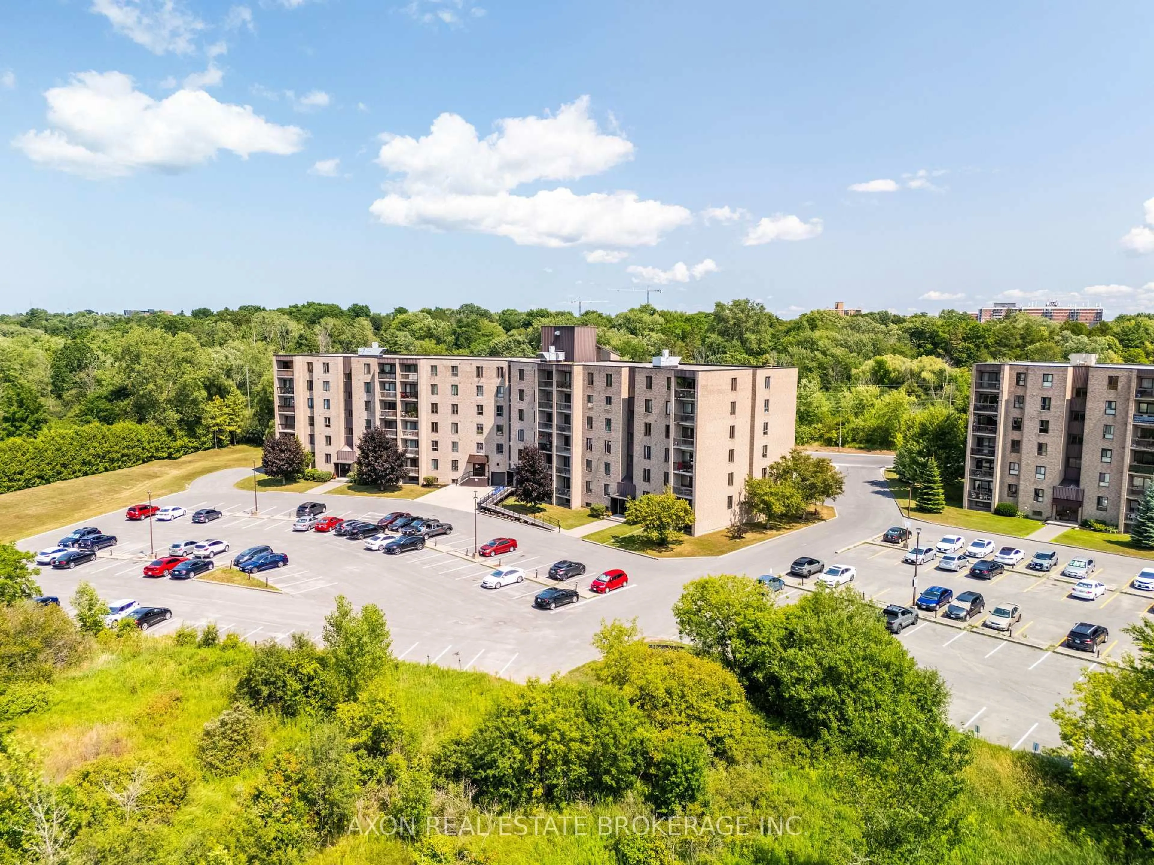 A pic from outside/outdoor area/front of a property/back of a property/a pic from drone, building for 358 Queen Mary Rd #501, Kingston Ontario K7M 7E8