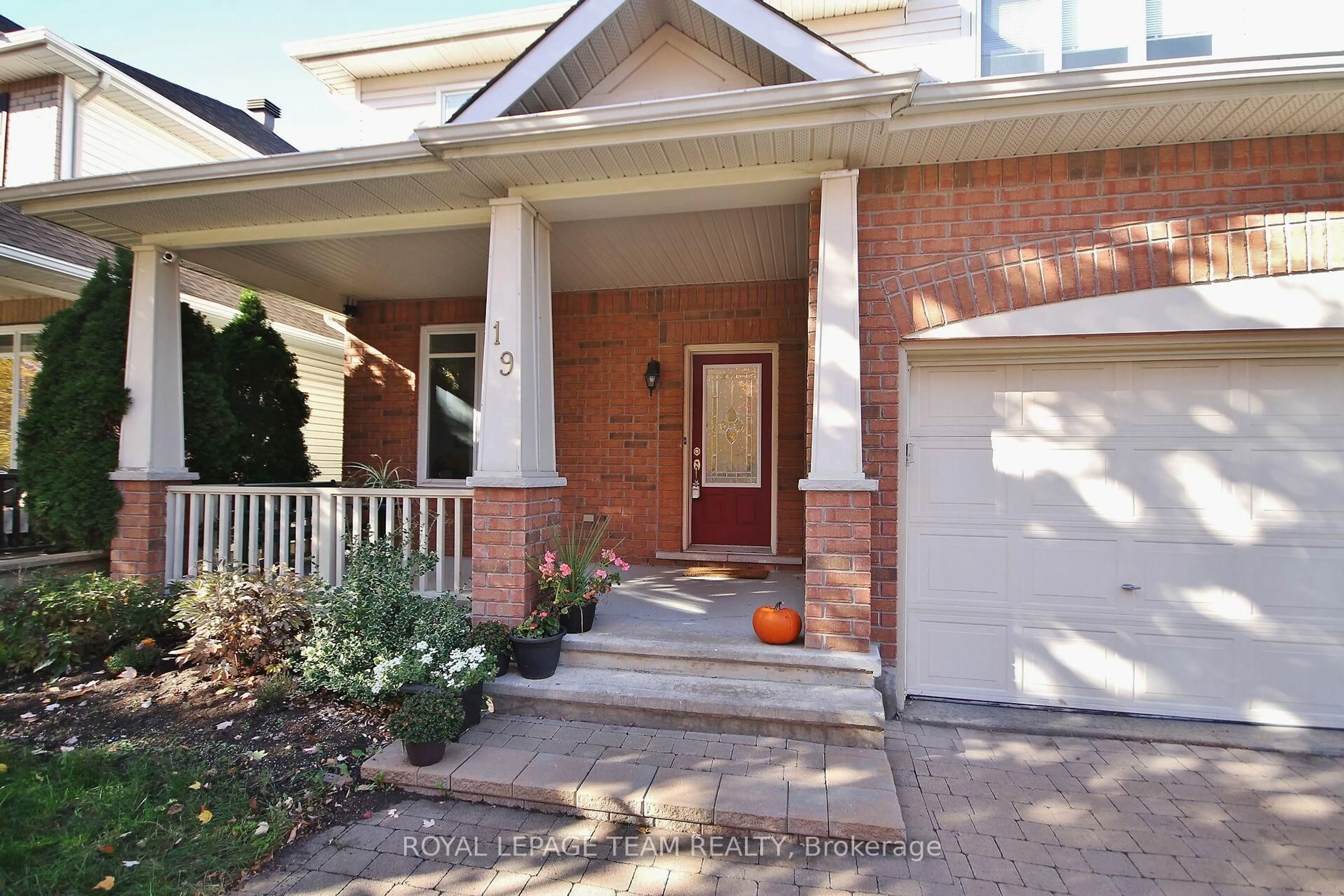 Home with brick exterior material, street for 19 Athena Way, Ottawa Ontario K2G 6S1