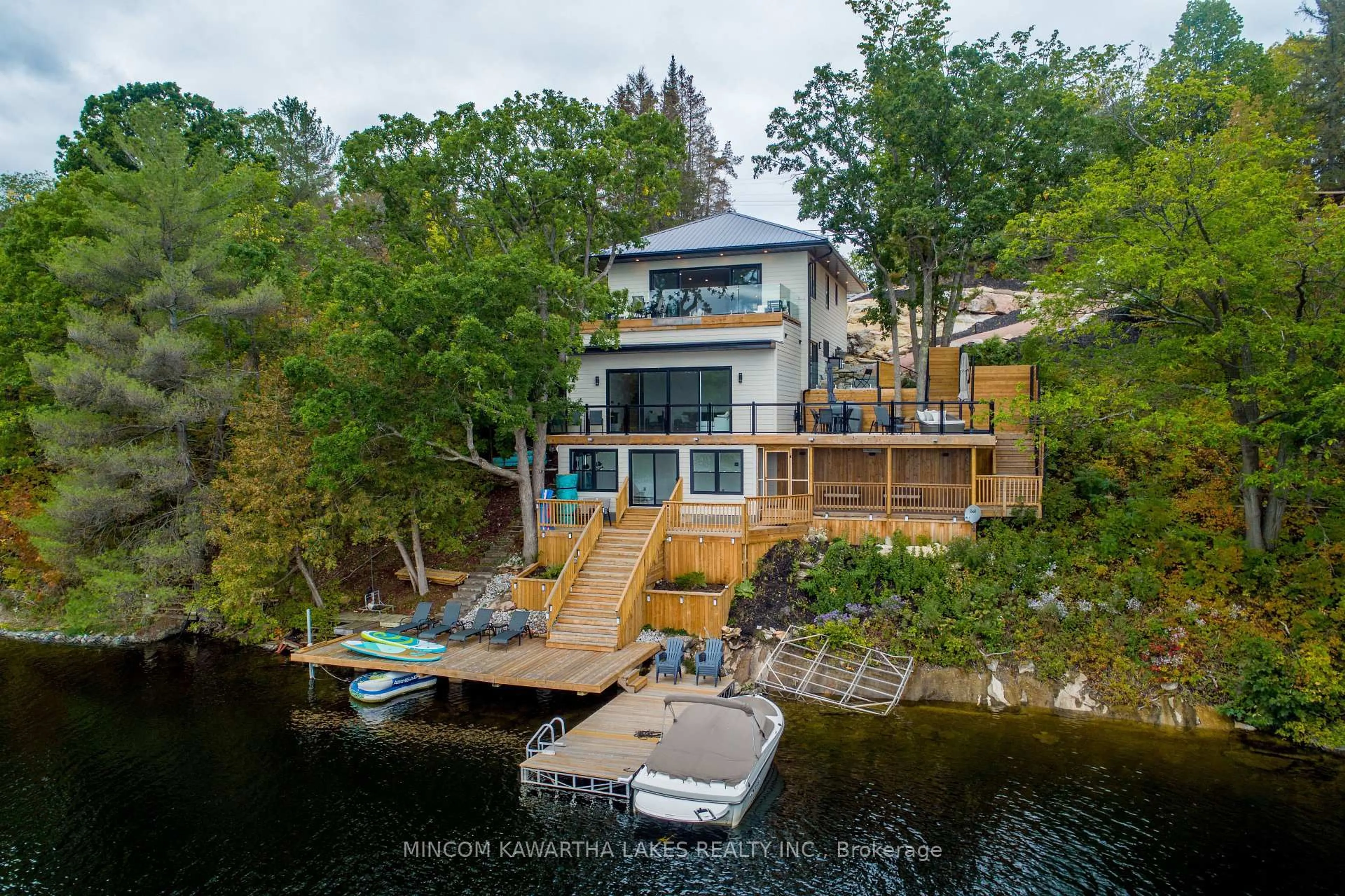 A pic from outside/outdoor area/front of a property/back of a property/a pic from drone, water/lake/river/ocean view for 1416 Northey's Bay Rd, North Kawartha Ontario K0L 3E0
