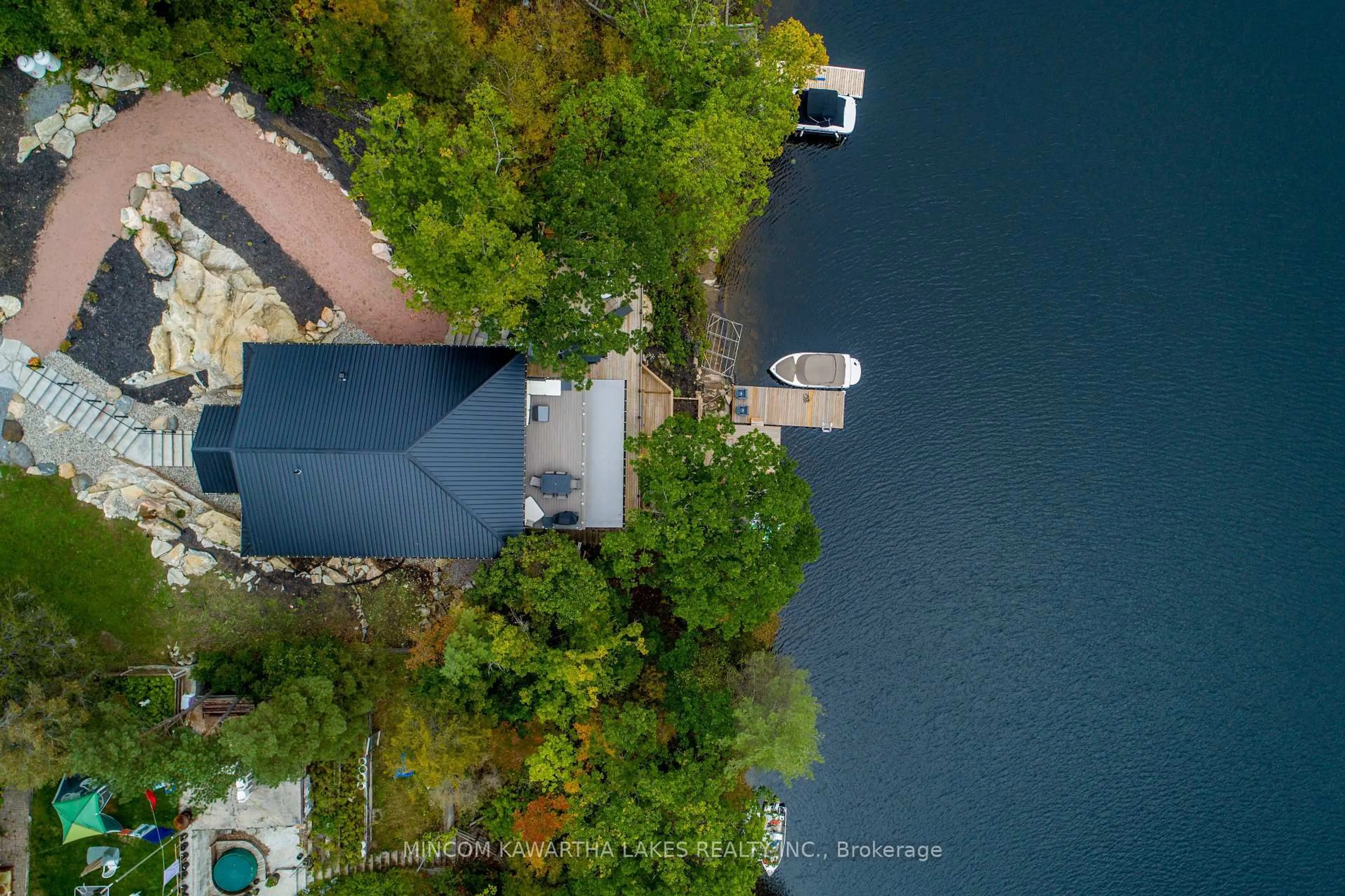 A pic from outside/outdoor area/front of a property/back of a property/a pic from drone, water/lake/river/ocean view for 1416 Northey's Bay Rd, North Kawartha Ontario K0L 3E0
