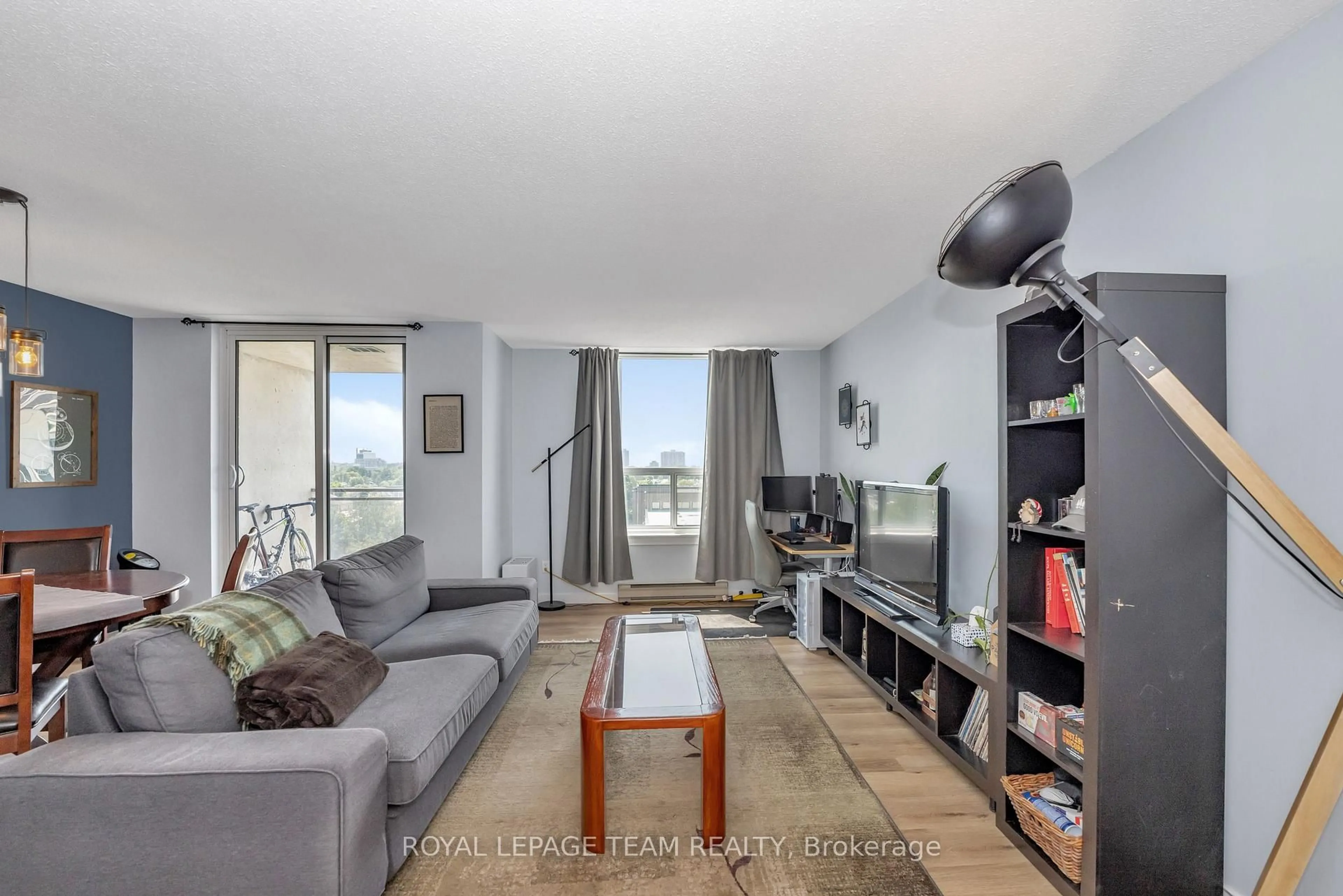 Living room with furniture, unknown for 215 Parkdale Ave #904, Ottawa Ontario K1Y 4T8