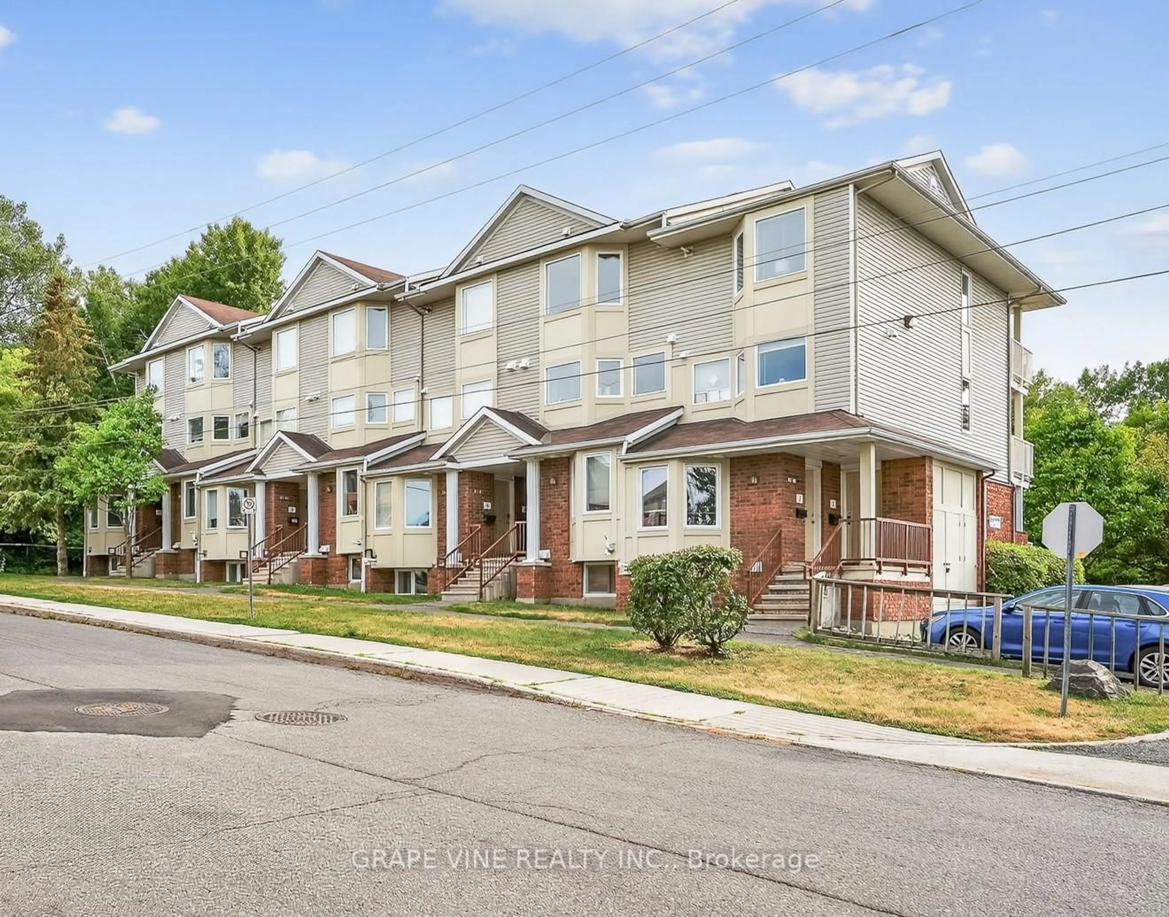 Home with brick exterior material, street for 1400 Wildberry Crt #11, Ottawa Ontario K1C 7K6