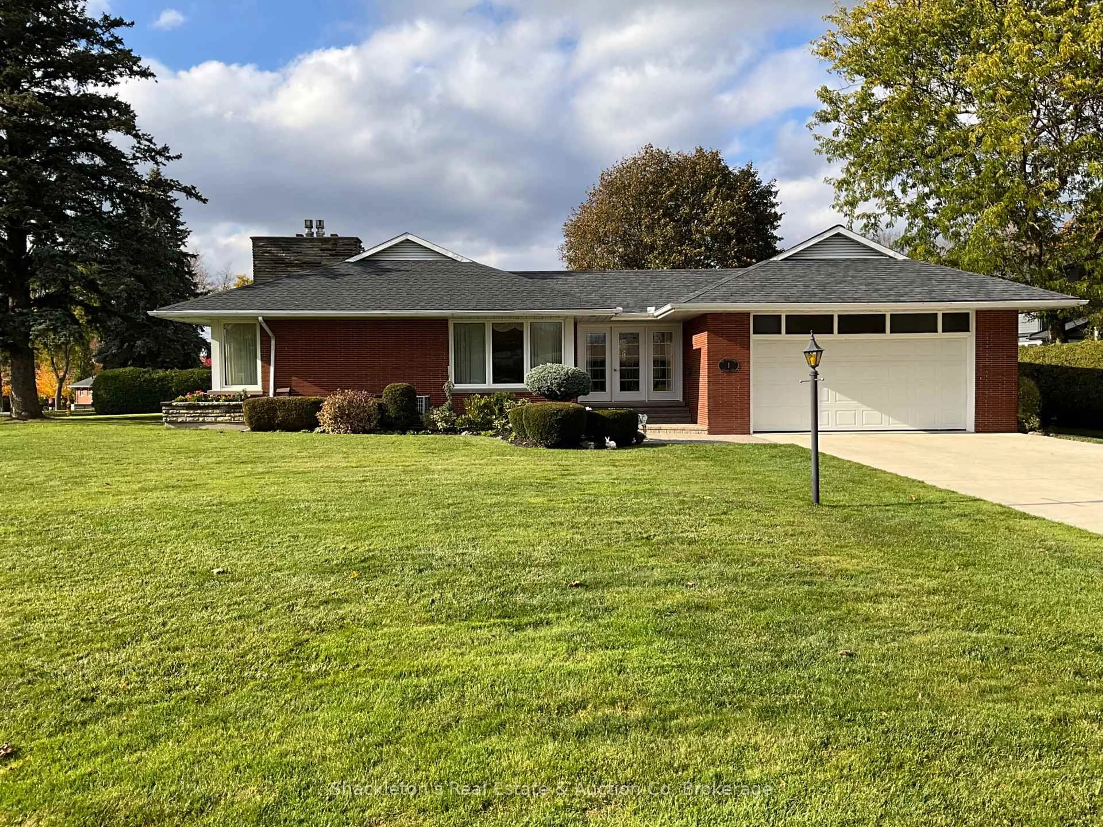 Home with vinyl exterior material, street for 1 Jackson Cres, North Perth Ontario N4W 1K2