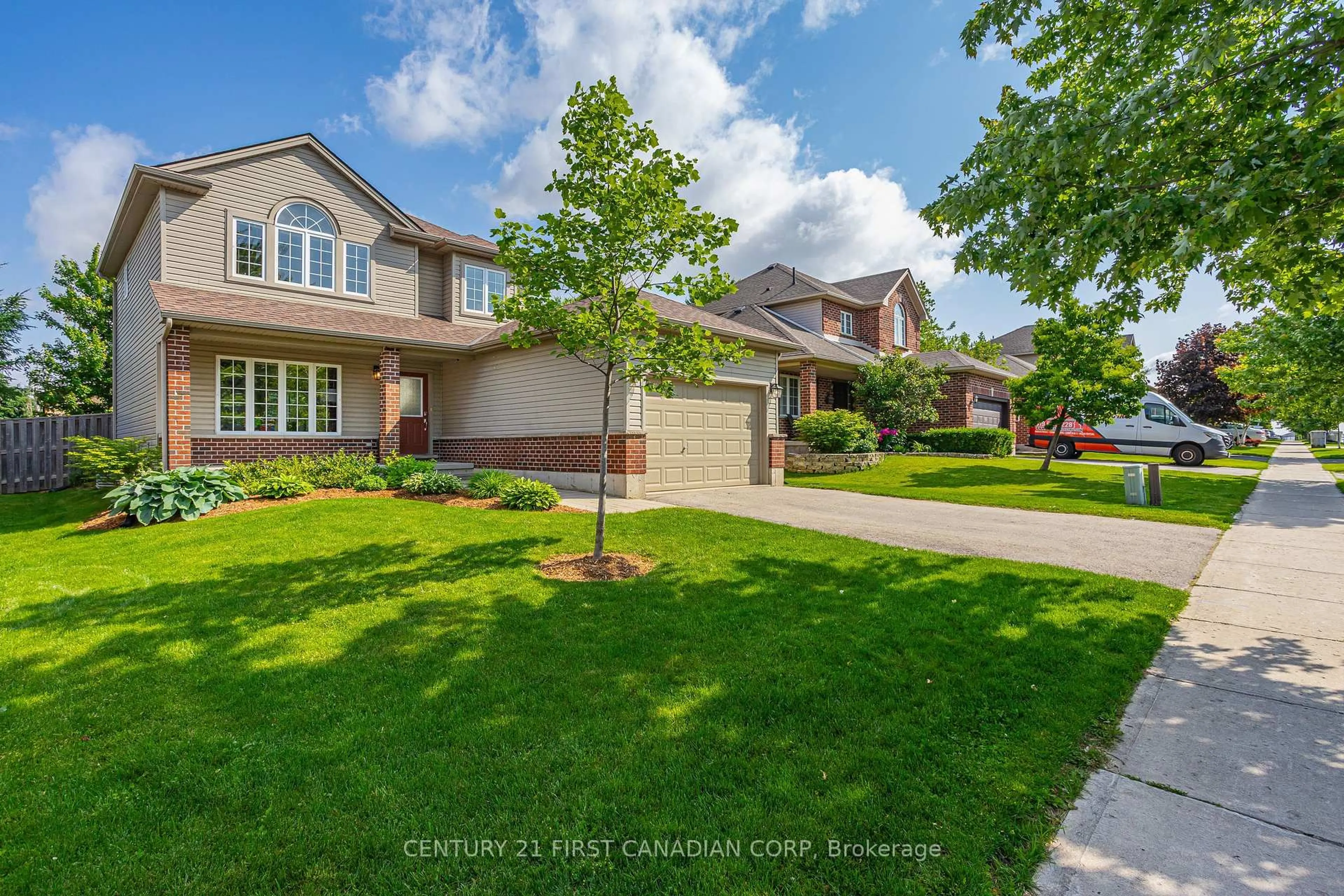 A pic from outside/outdoor area/front of a property/back of a property/a pic from drone, street for 32 Stonefield Lane, Middlesex Centre Ontario N0M 2A0