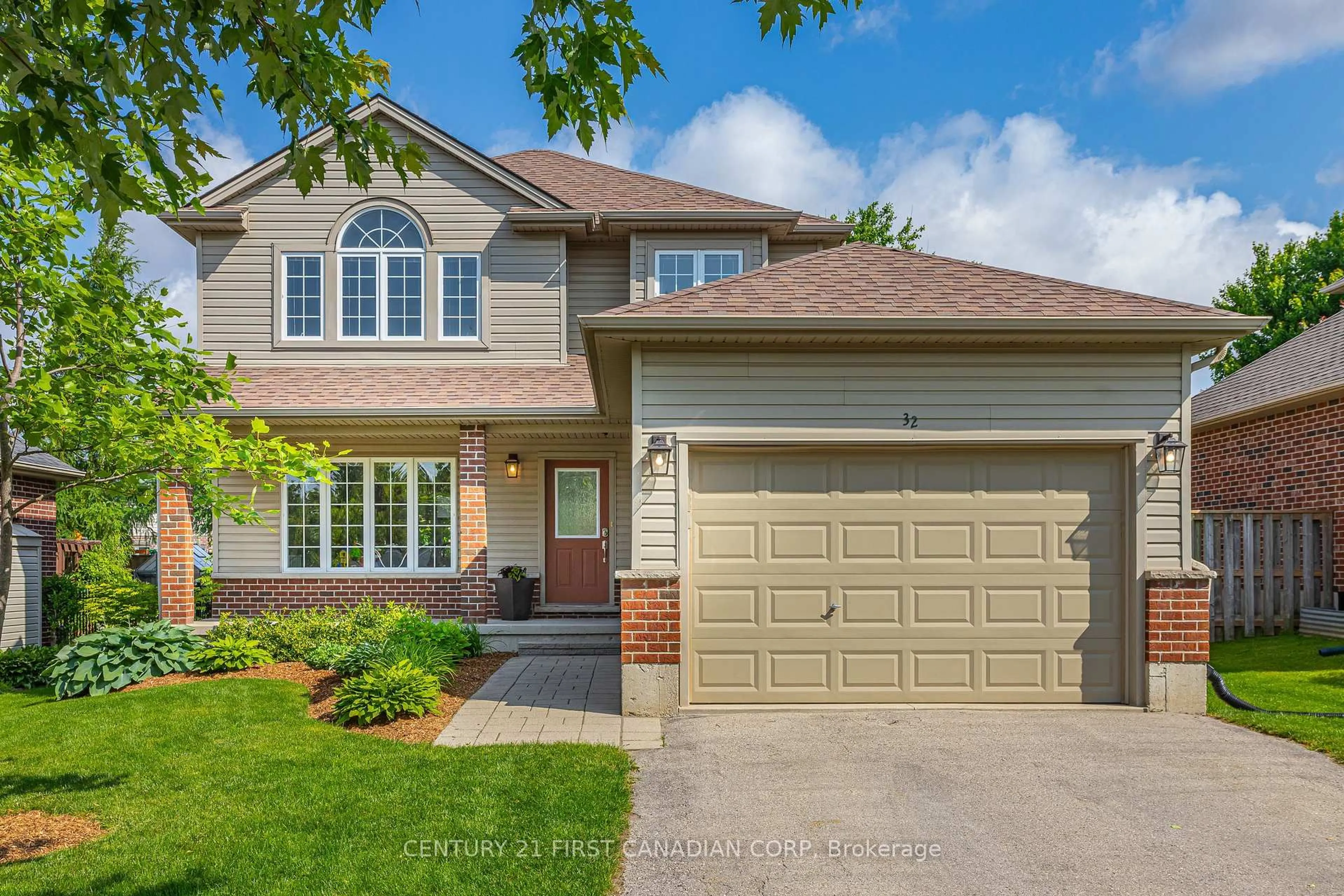 Home with brick exterior material, street for 32 Stonefield Lane, Middlesex Centre Ontario N0M 2A0