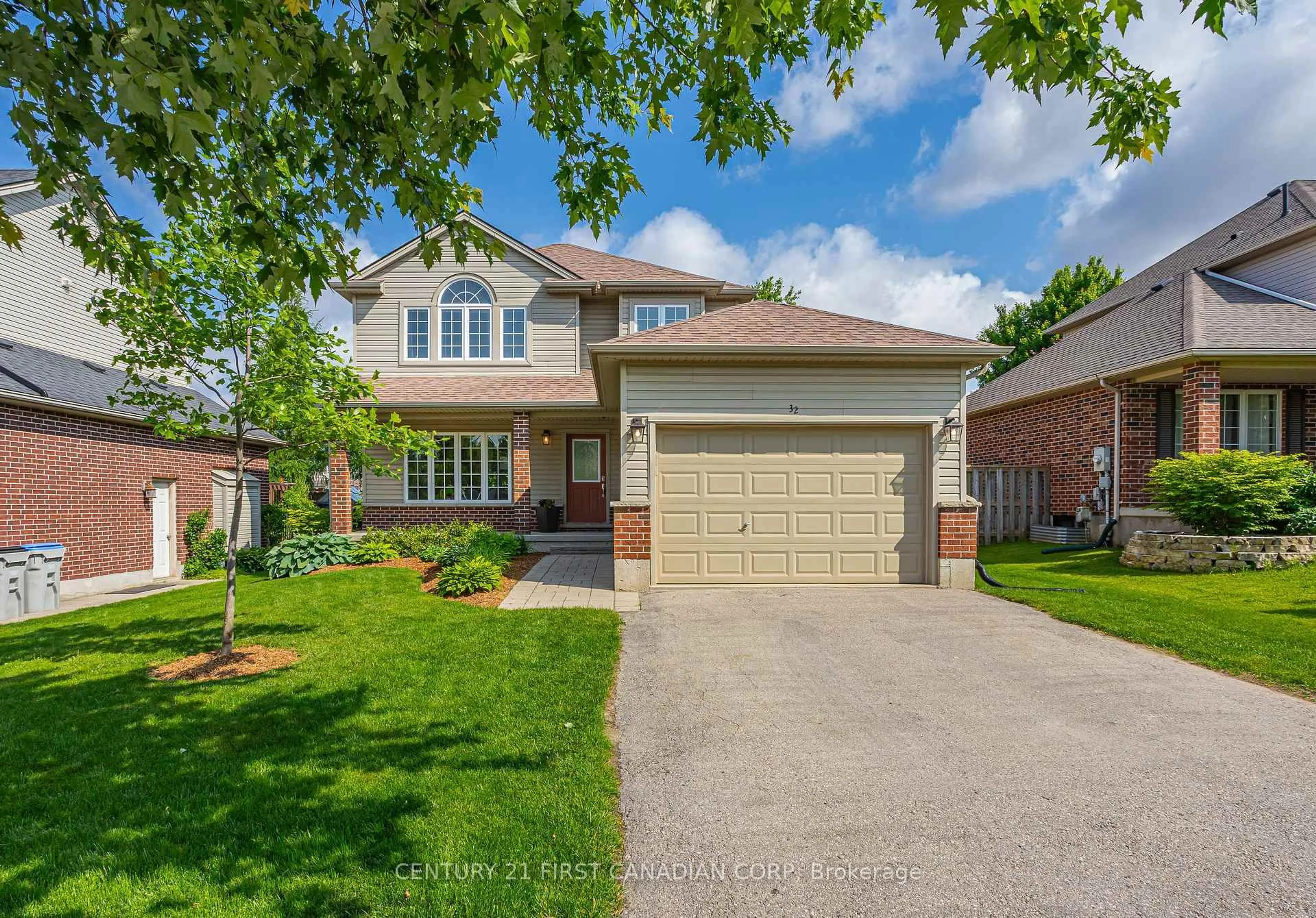 Home with brick exterior material, street for 32 Stonefield Lane, Middlesex Centre Ontario N0M 2A0