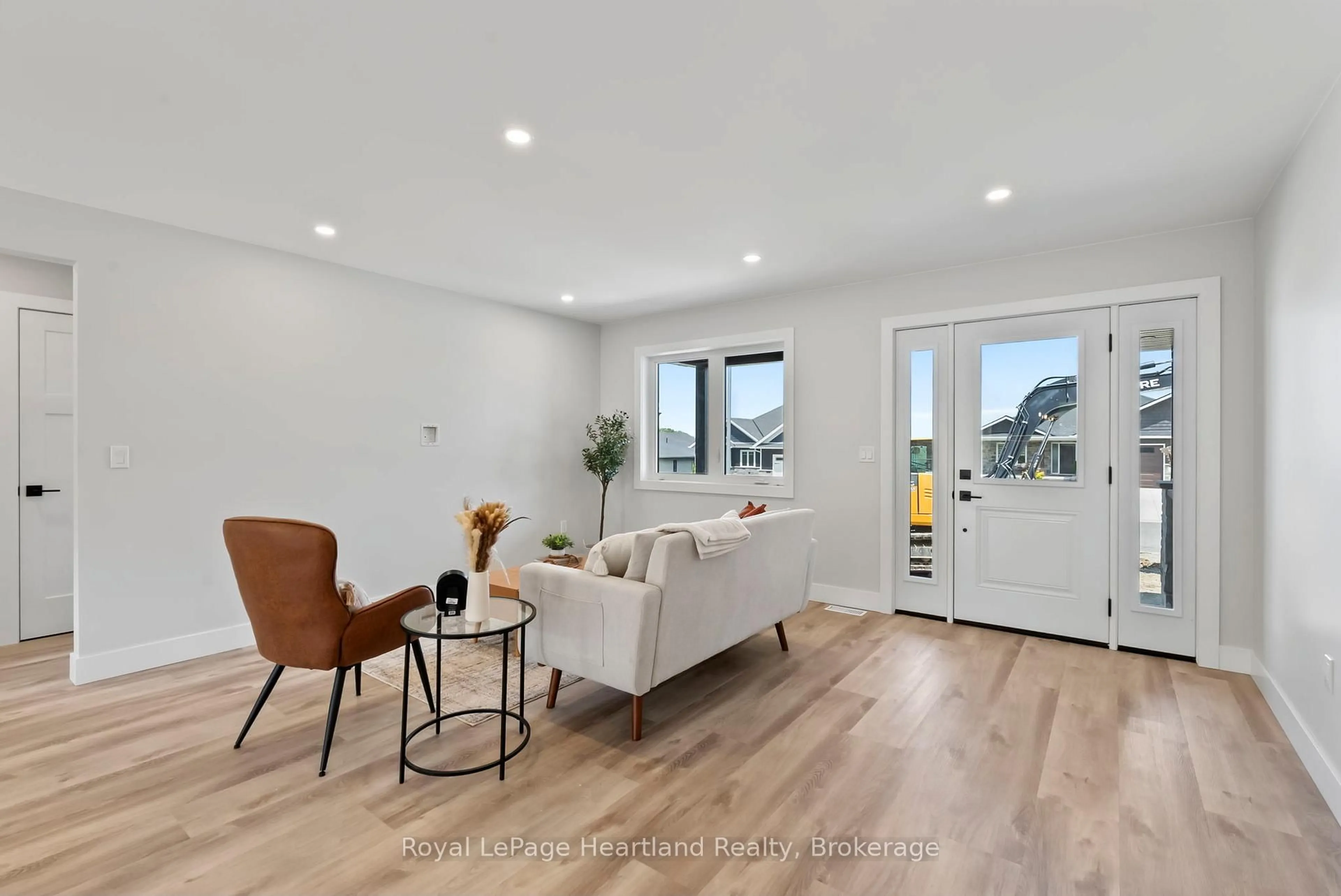 Living room with furniture, wood/laminate floor for 6 Noeckerville Hill Dr, South Bruce Ontario N0G 2J0