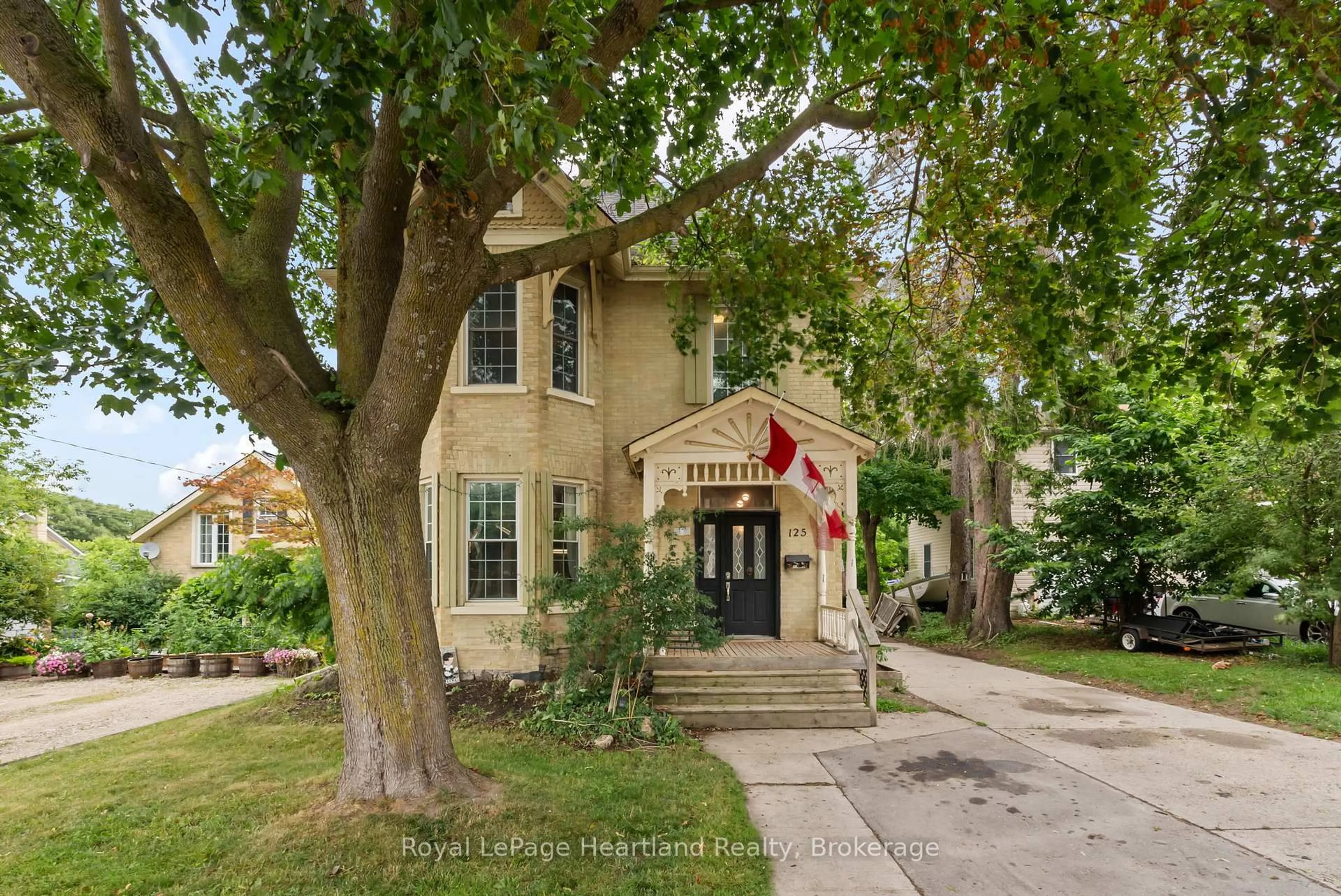 Home with brick exterior material, street for 125 ELORA St, Minto Ontario N0G 1Z0