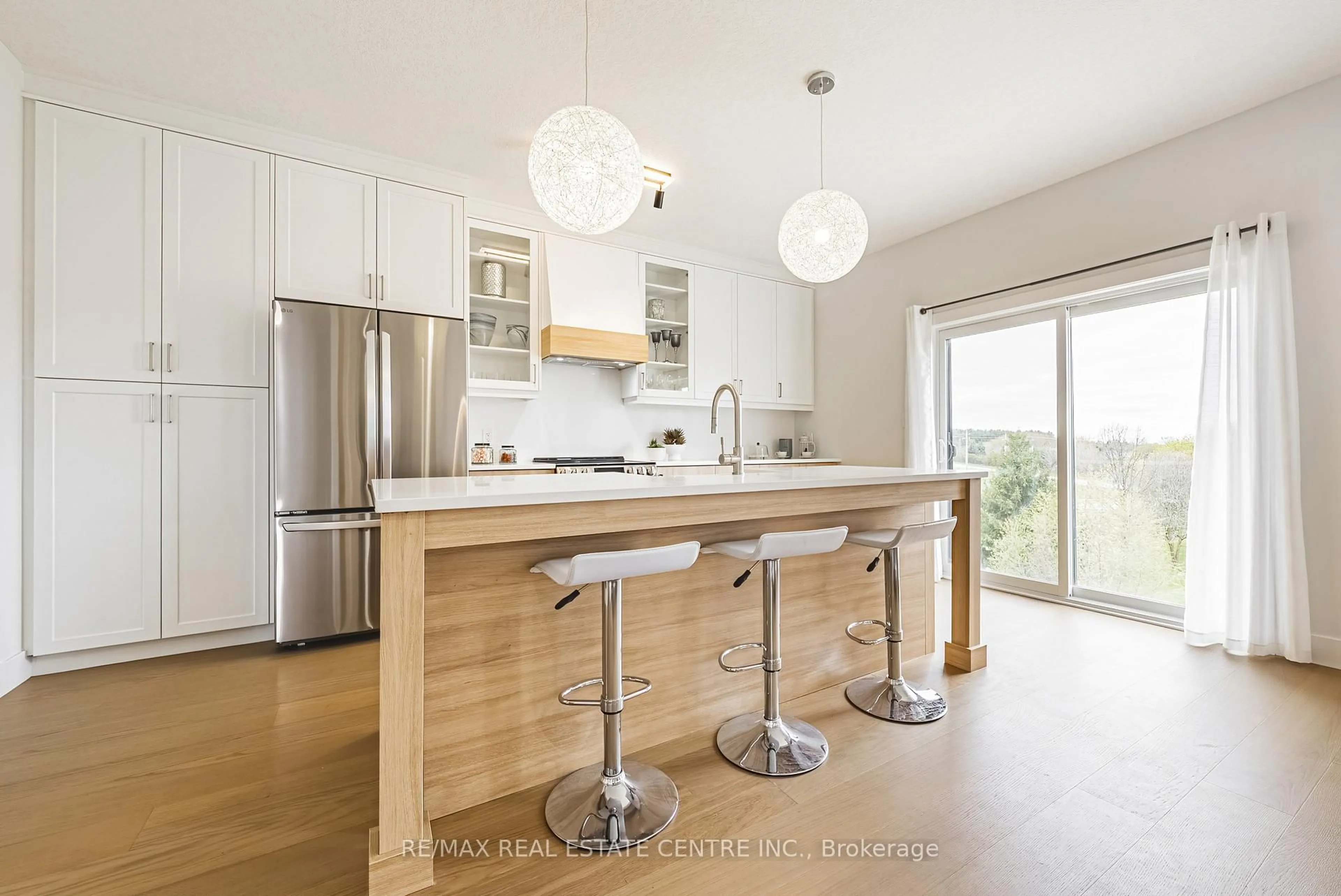 Contemporary kitchen, wood/laminate floor for 200 Benninger Dr, Kitchener Ontario N2E 0C9