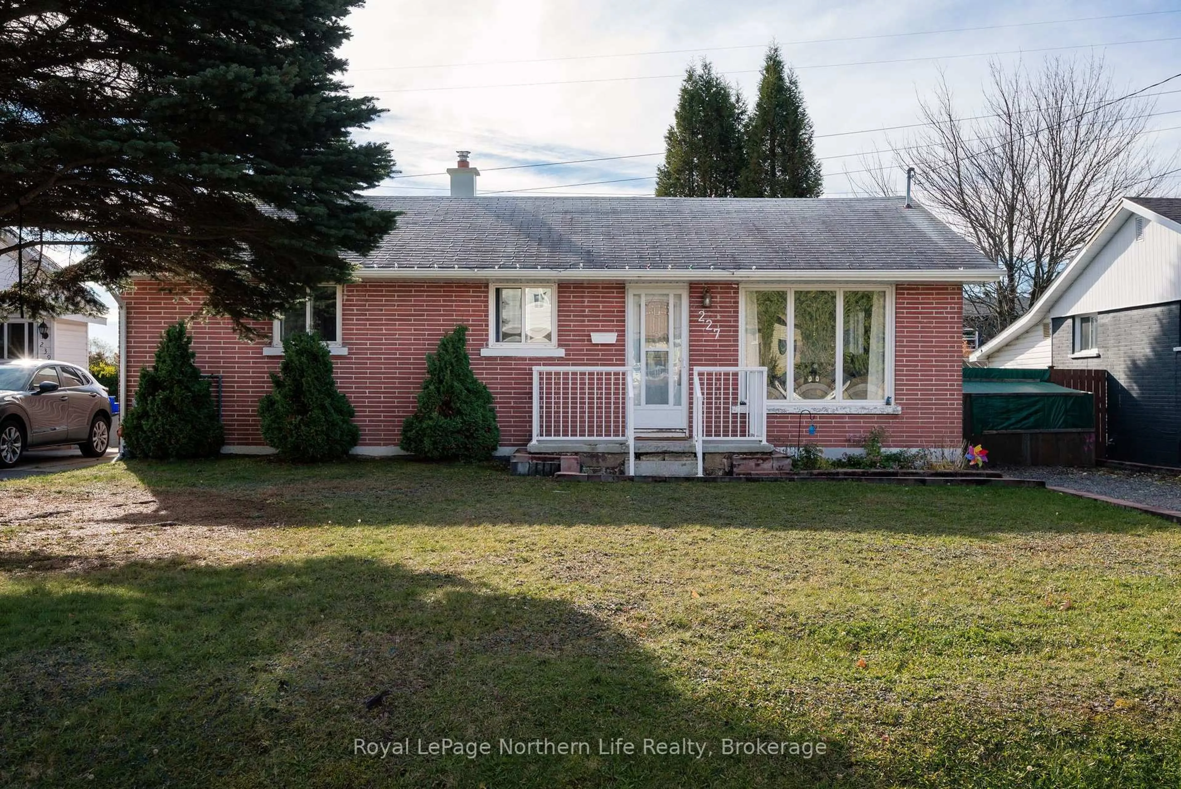 Home with vinyl exterior material, street for 227 Terrace Lawn Dr, North Bay Ontario P1B 7P5