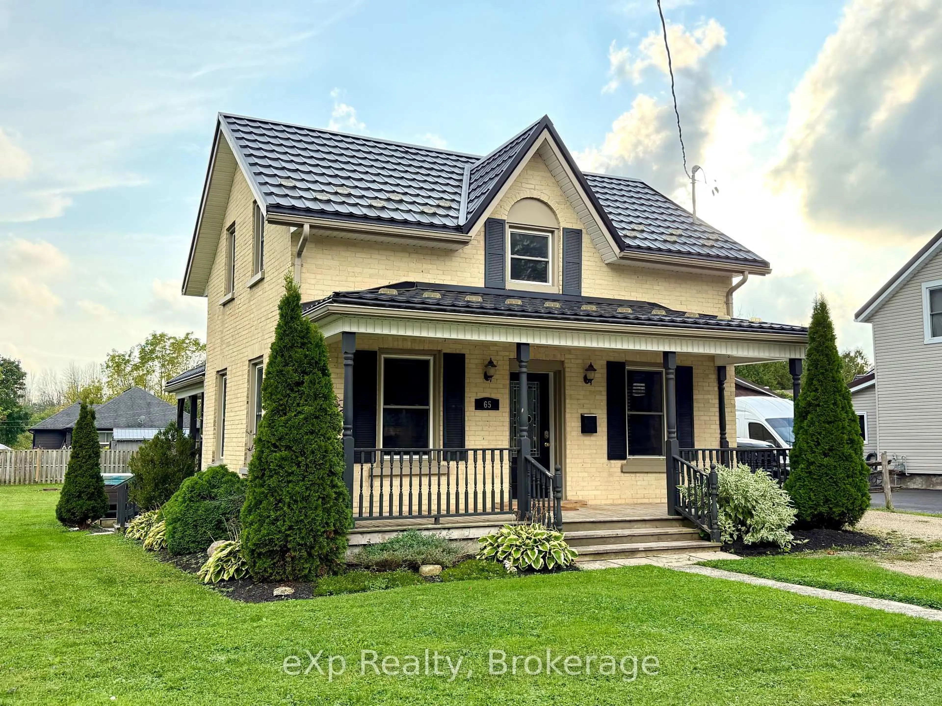 Home with vinyl exterior material, street for 65 Elora St, Minto Ontario N0G 1M0