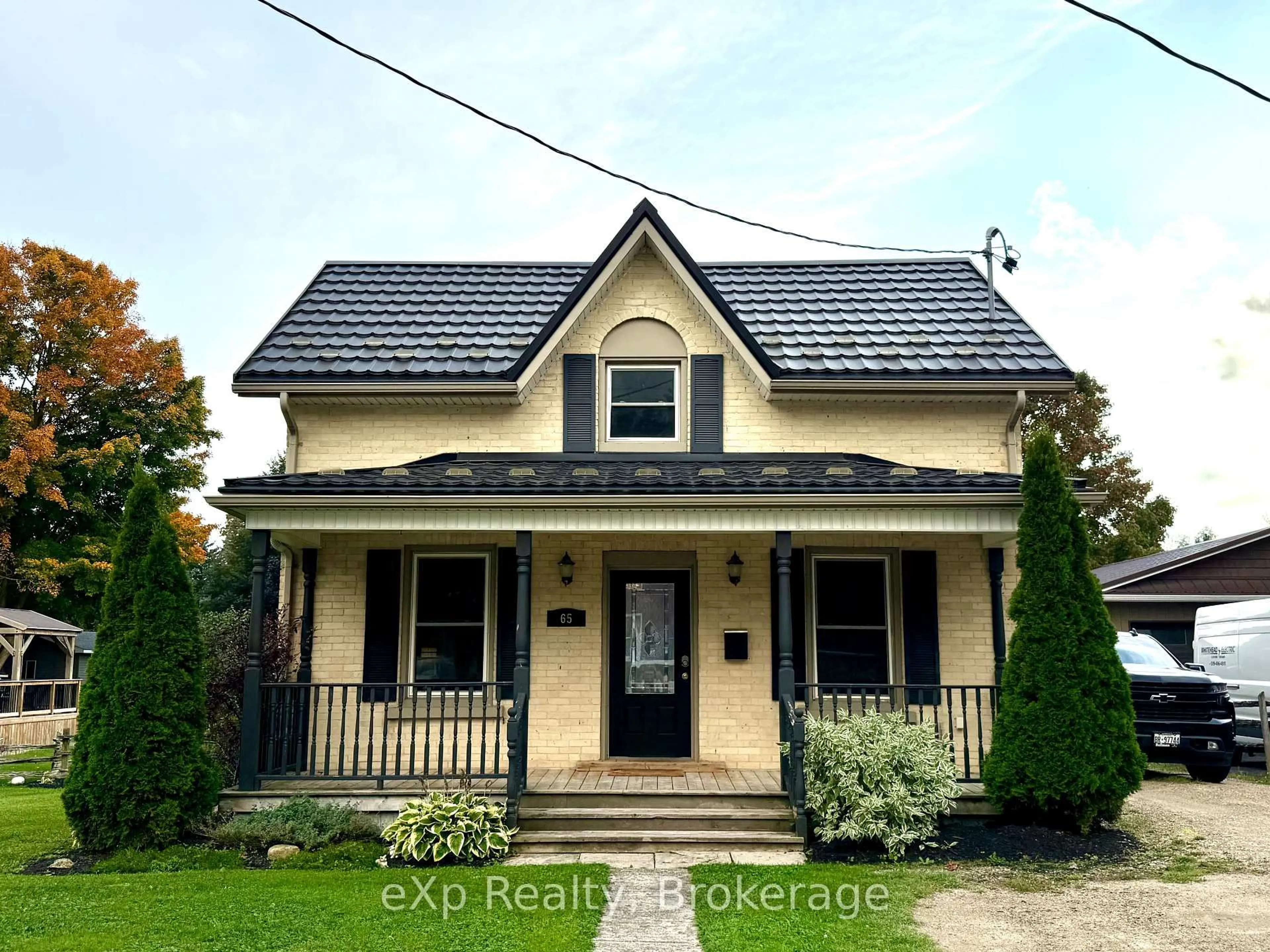 Home with vinyl exterior material, street for 65 Elora St, Minto Ontario N0G 1M0