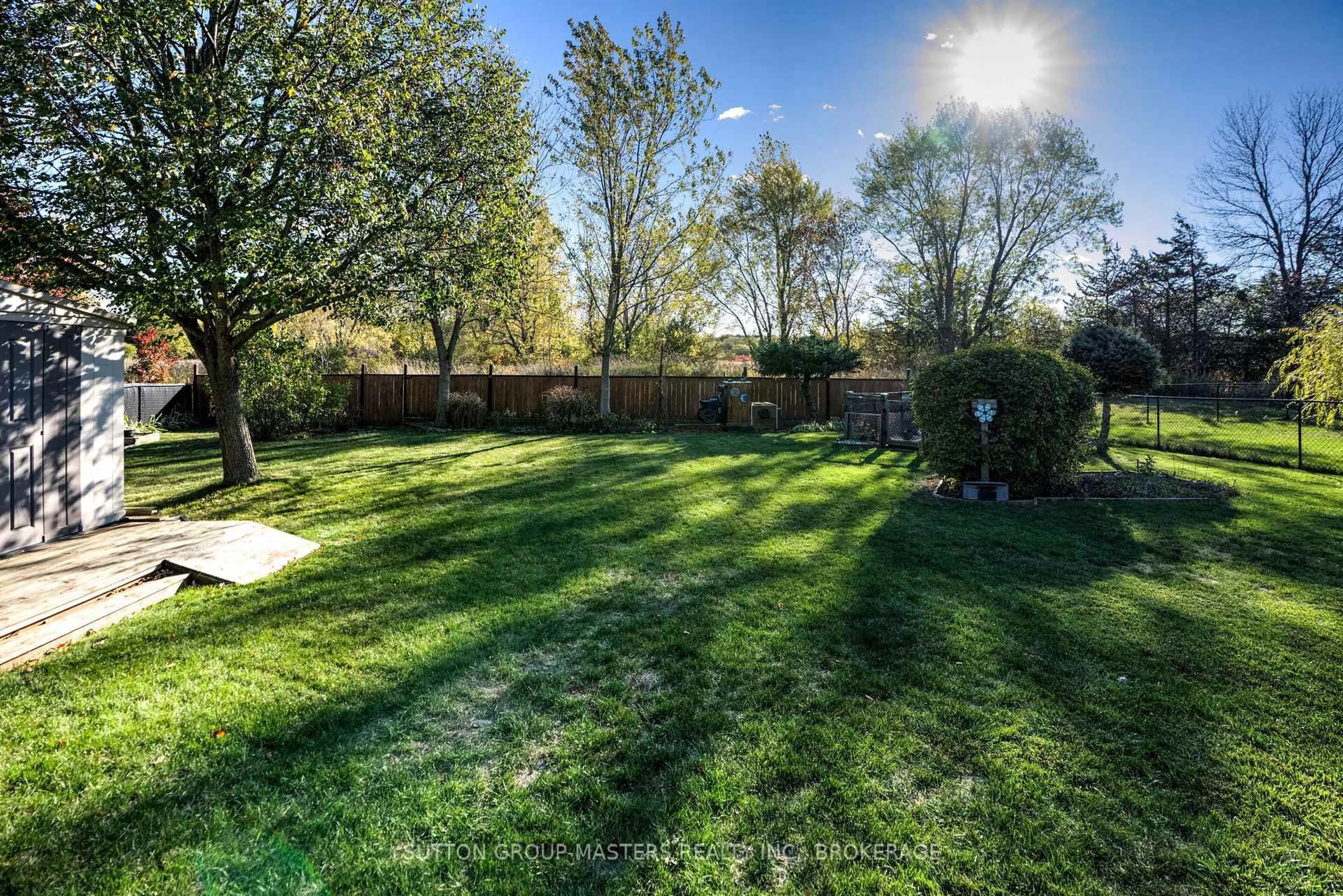 A pic from outside/outdoor area/front of a property/back of a property/a pic from drone, forest/trees view for 8 HAWLEY Crt, Bath Ontario K0H 1G0