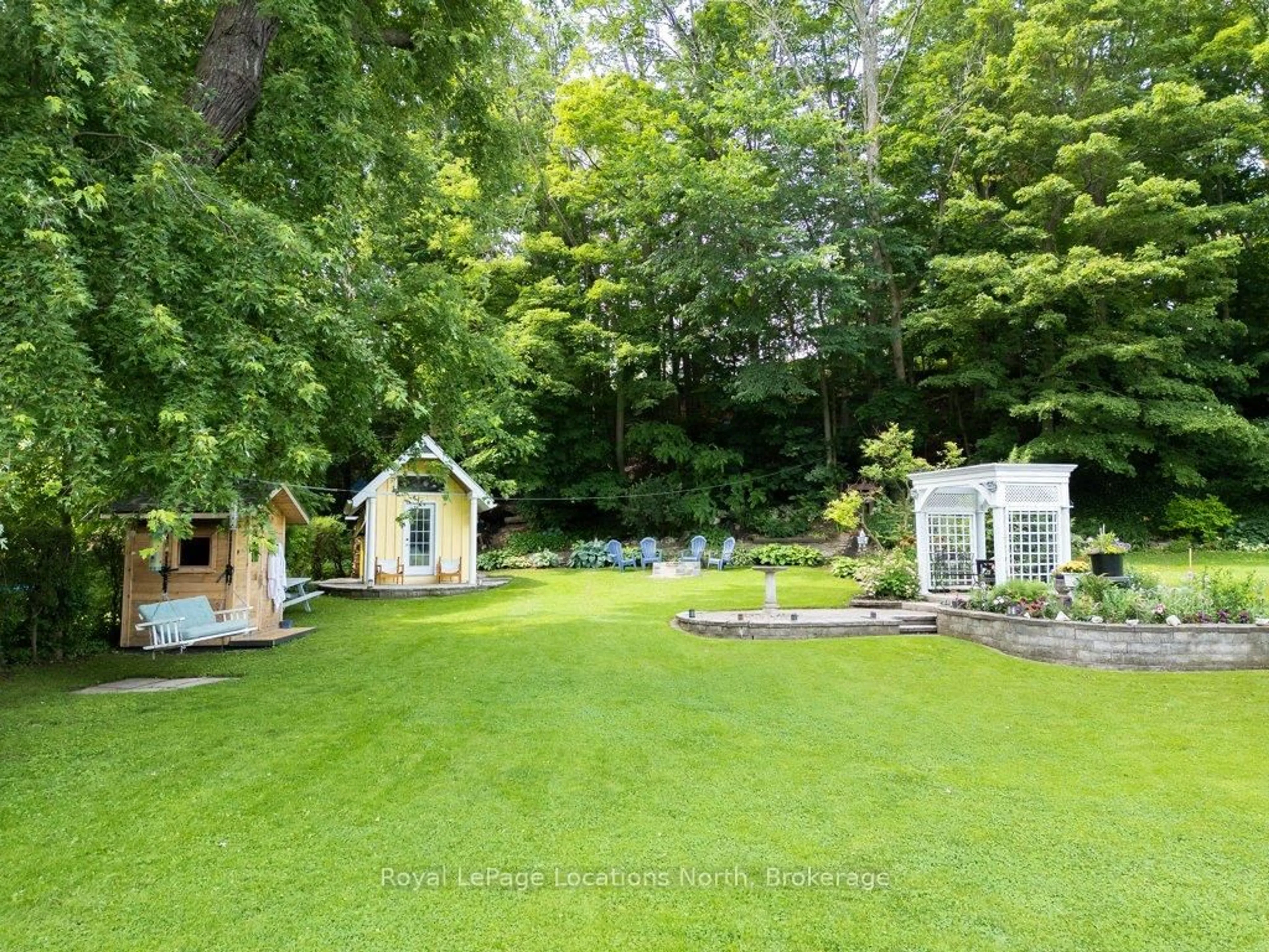 A pic from outside/outdoor area/front of a property/back of a property/a pic from drone, forest/trees view for 25 Edwin St, Meaford Ontario N4L 1E4