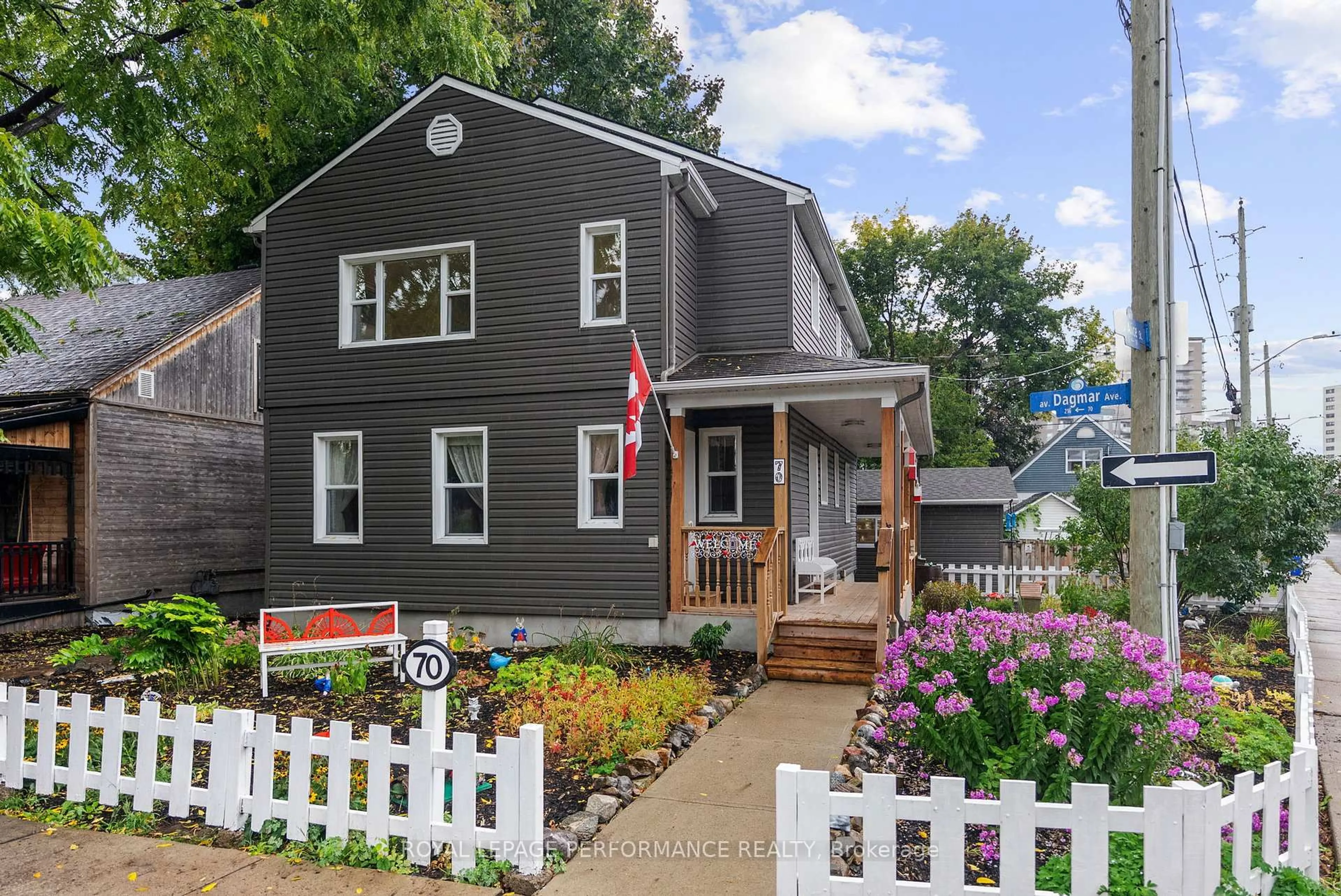 Home with vinyl exterior material, street for 72 Dagmar Ave, Ottawa Ontario K1L 5T4