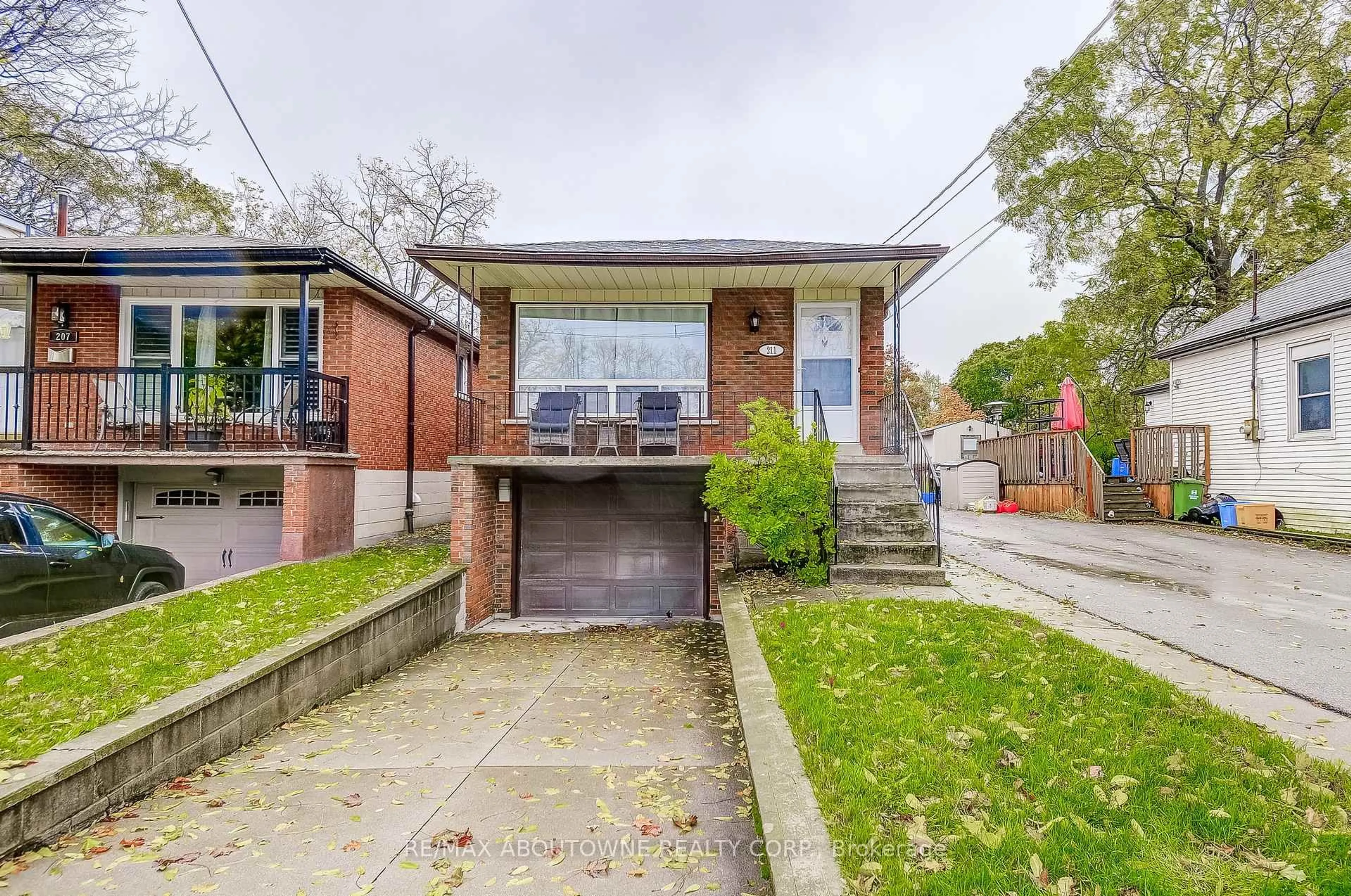 Home with brick exterior material, street for 211 East 8th St, Hamilton Ontario L9A 3L7