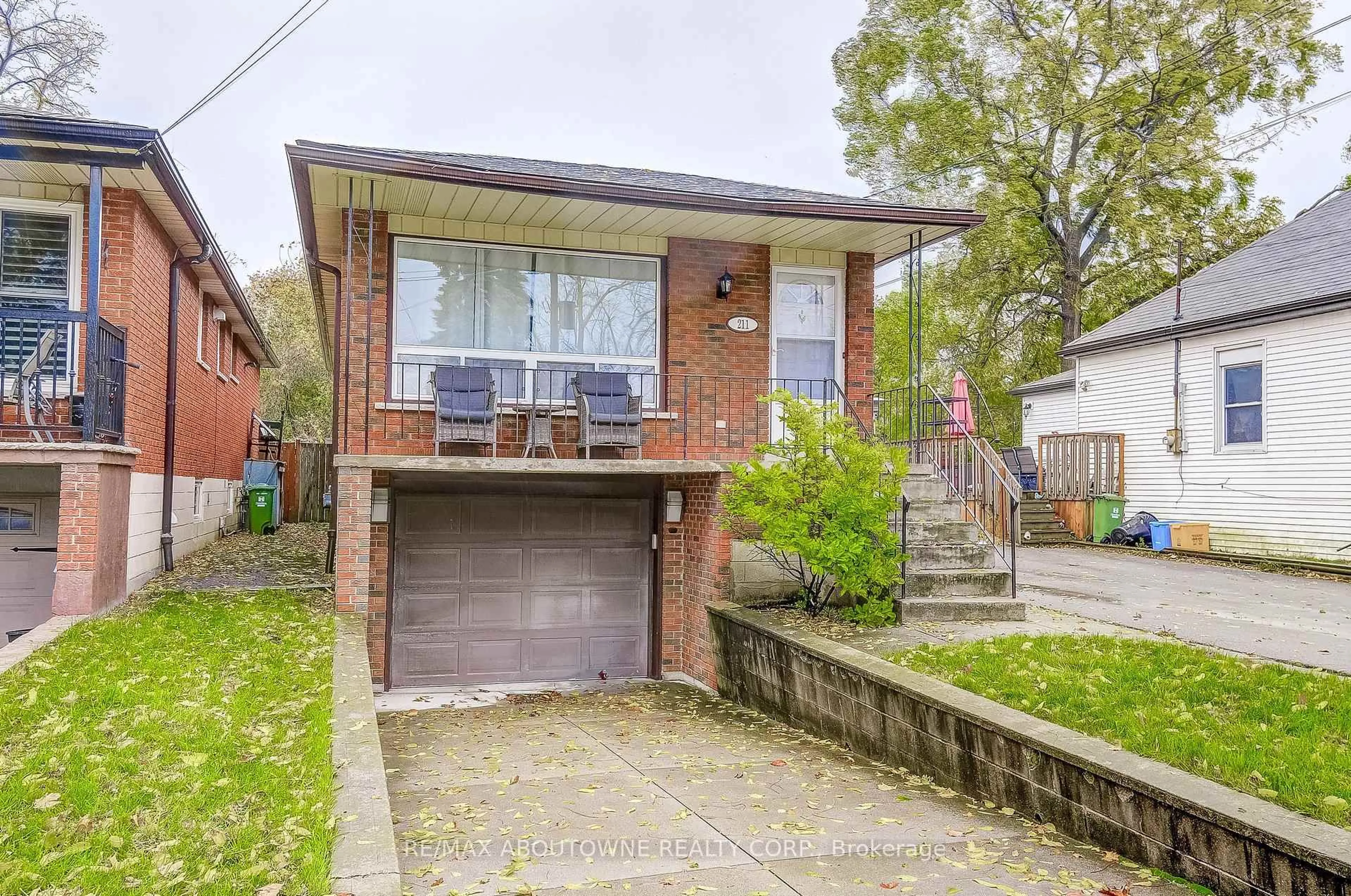 Home with brick exterior material, street for 211 East 8th St, Hamilton Ontario L9A 3L7