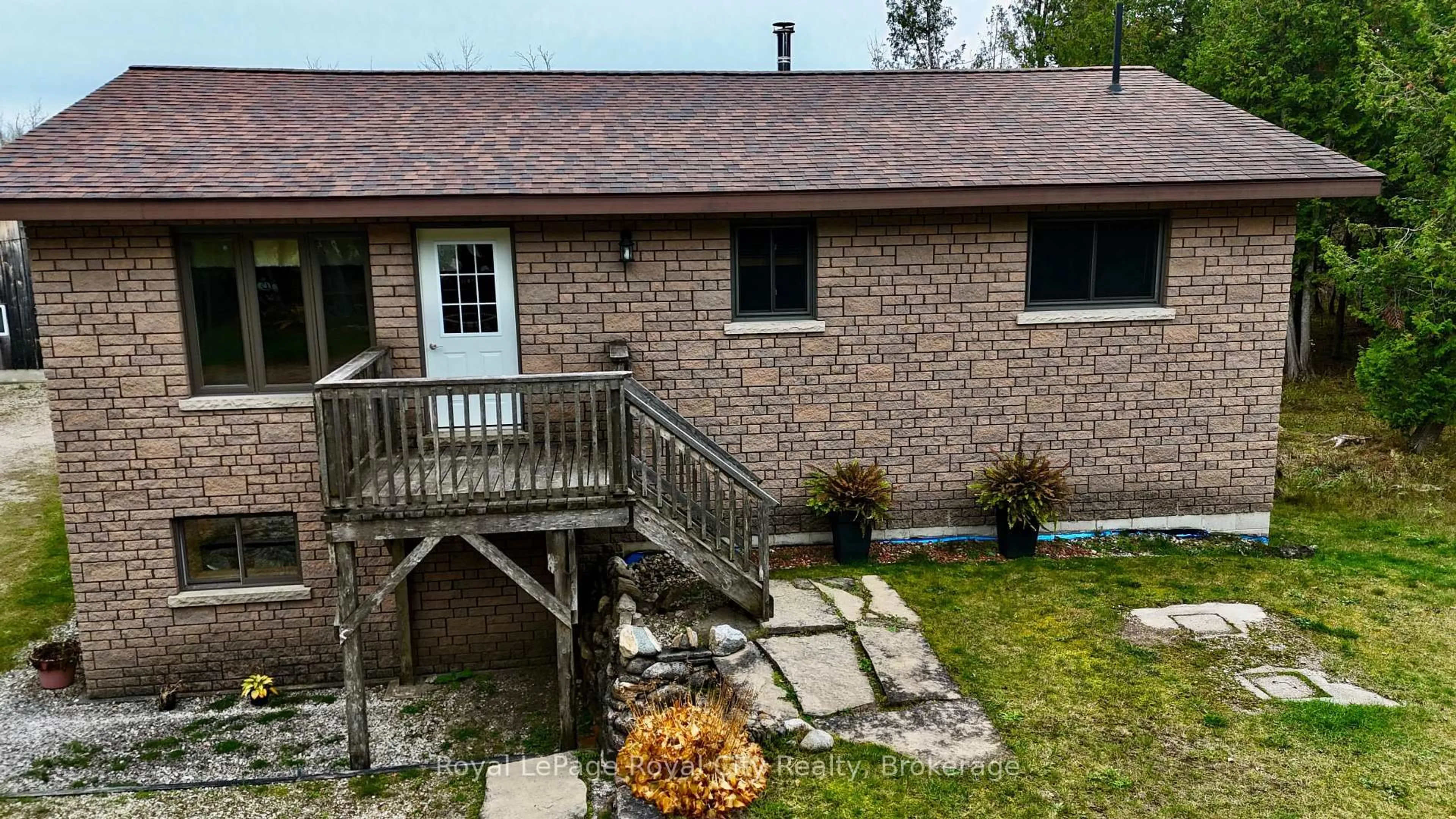 A pic from outside/outdoor area/front of a property/back of a property/a pic from drone, unknown for 26 Little Cove Rd, Northern Bruce Peninsula Ontario N0H 2R0