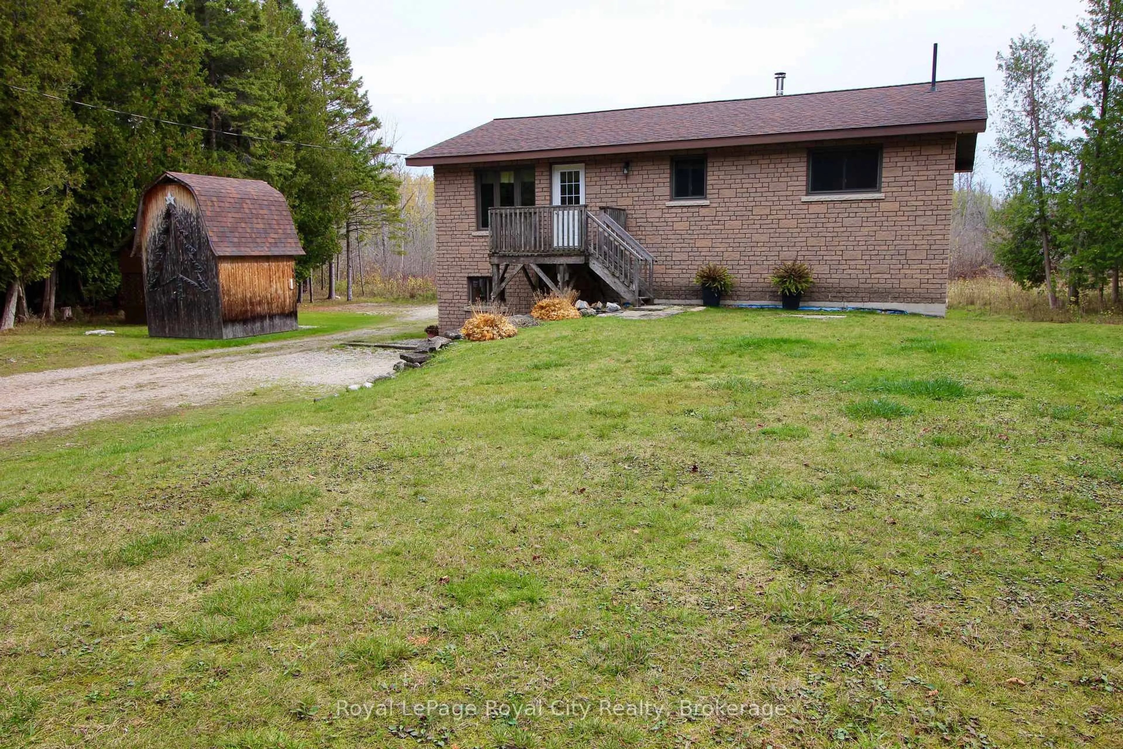 A pic from outside/outdoor area/front of a property/back of a property/a pic from drone, unknown for 26 Little Cove Rd, Northern Bruce Peninsula Ontario N0H 2R0