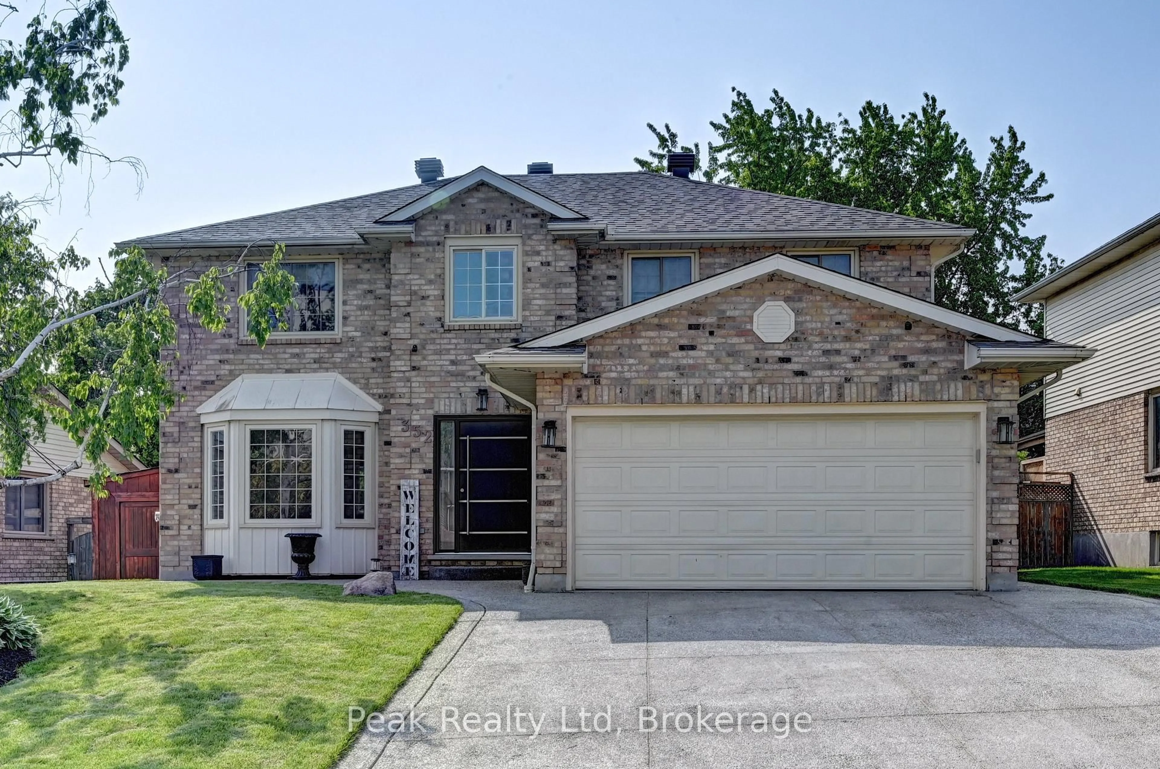 Home with brick exterior material, street for 352 Stephanie Dr, Guelph Ontario N1K 1R3