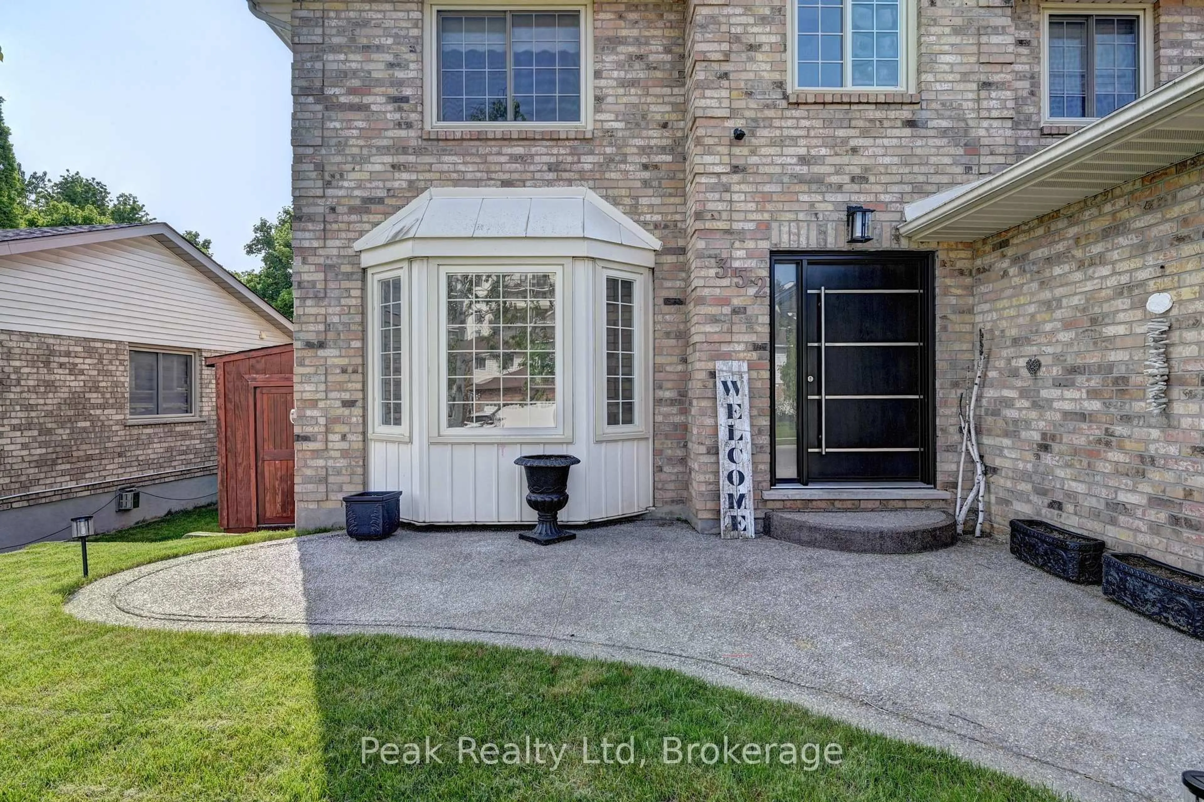 Home with brick exterior material, street for 352 Stephanie Dr, Guelph Ontario N1K 1R3