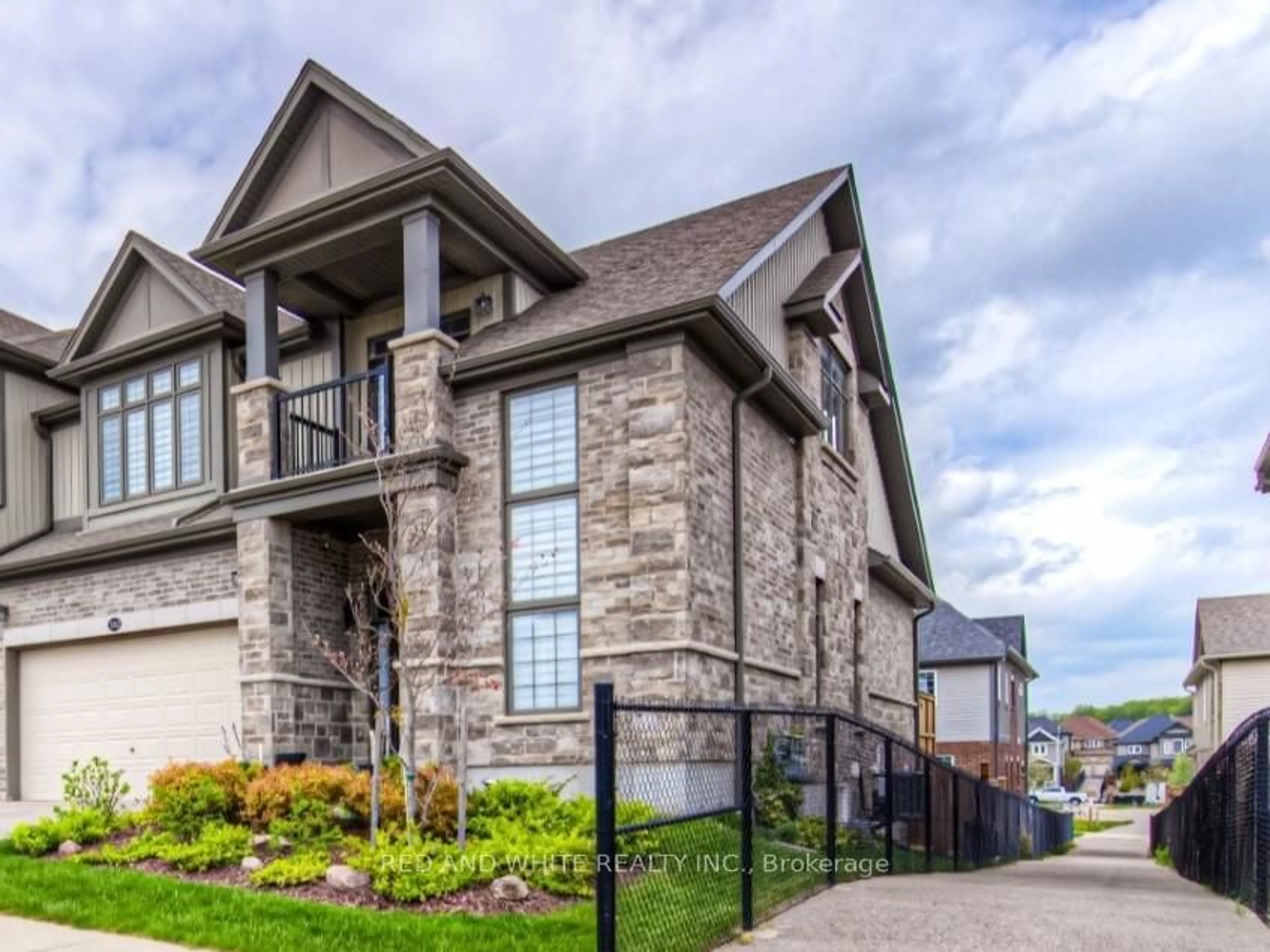 Home with brick exterior material, street for 582 Mayapple St, Waterloo Ontario N2V 0E3