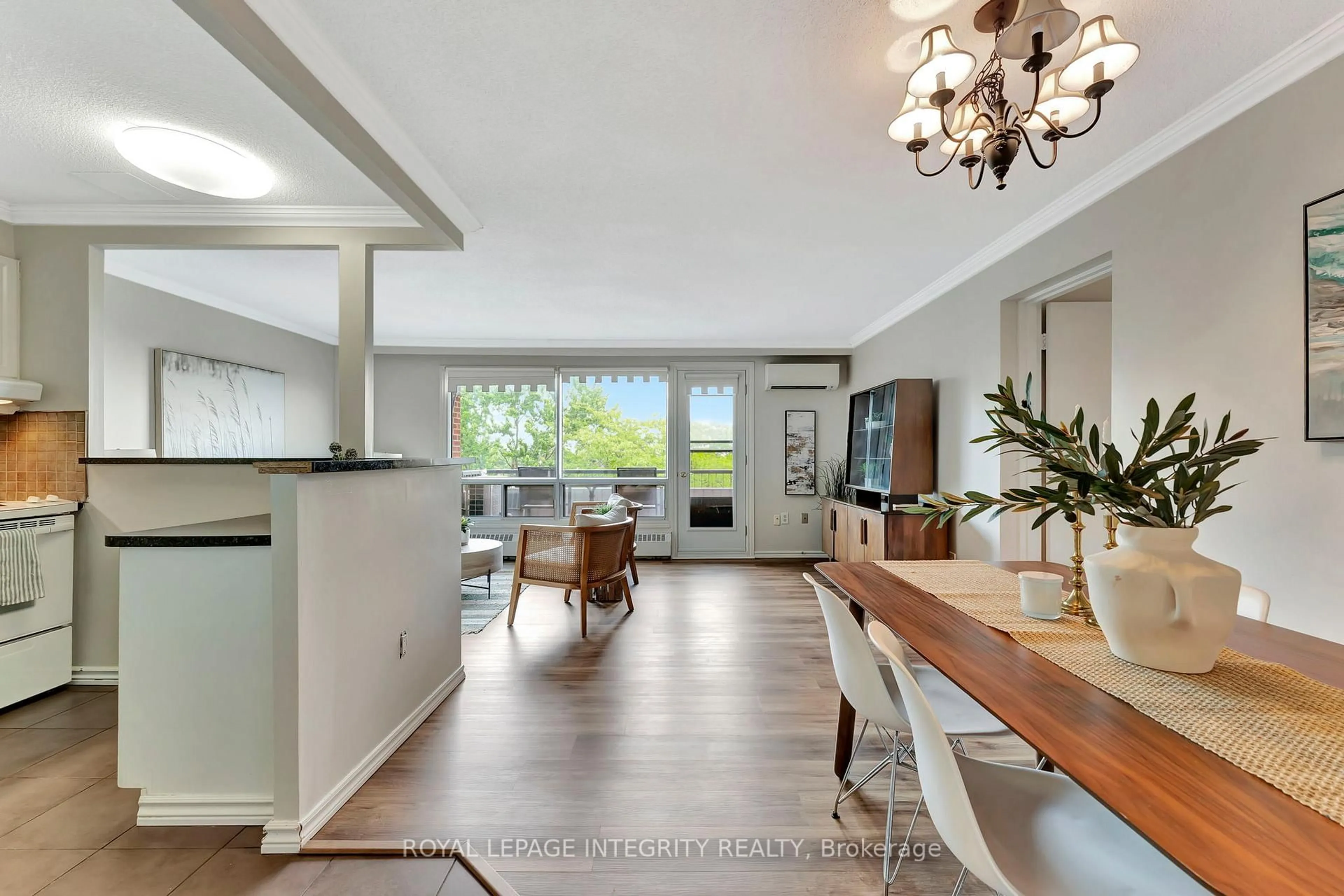 Open concept kitchen, wood/laminate floor for 20 Chesterton Dr #504, Ottawa Ontario K2E 6Z7