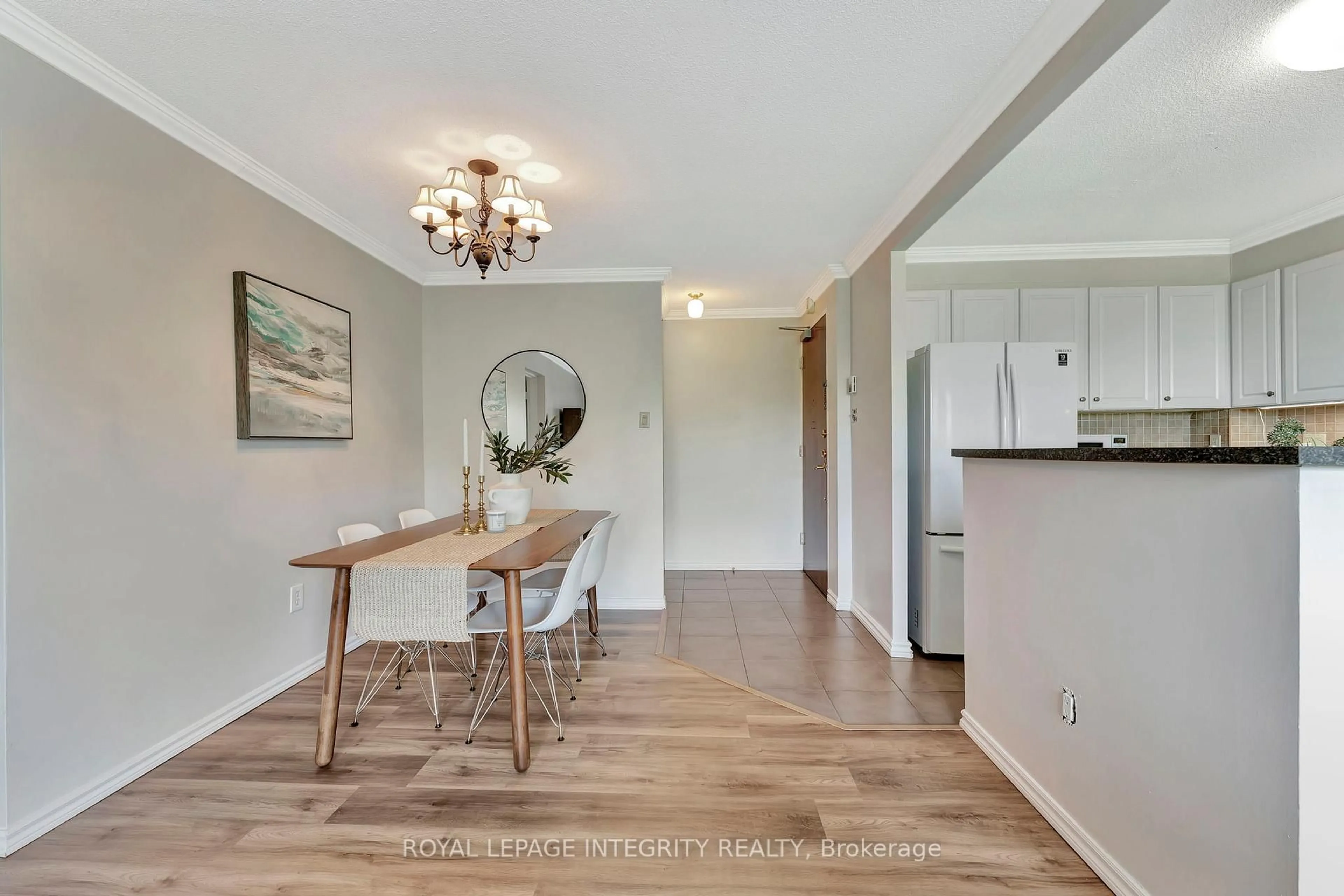Open concept kitchen, wood/laminate floor for 20 Chesterton Dr #504, Ottawa Ontario K2E 6Z7